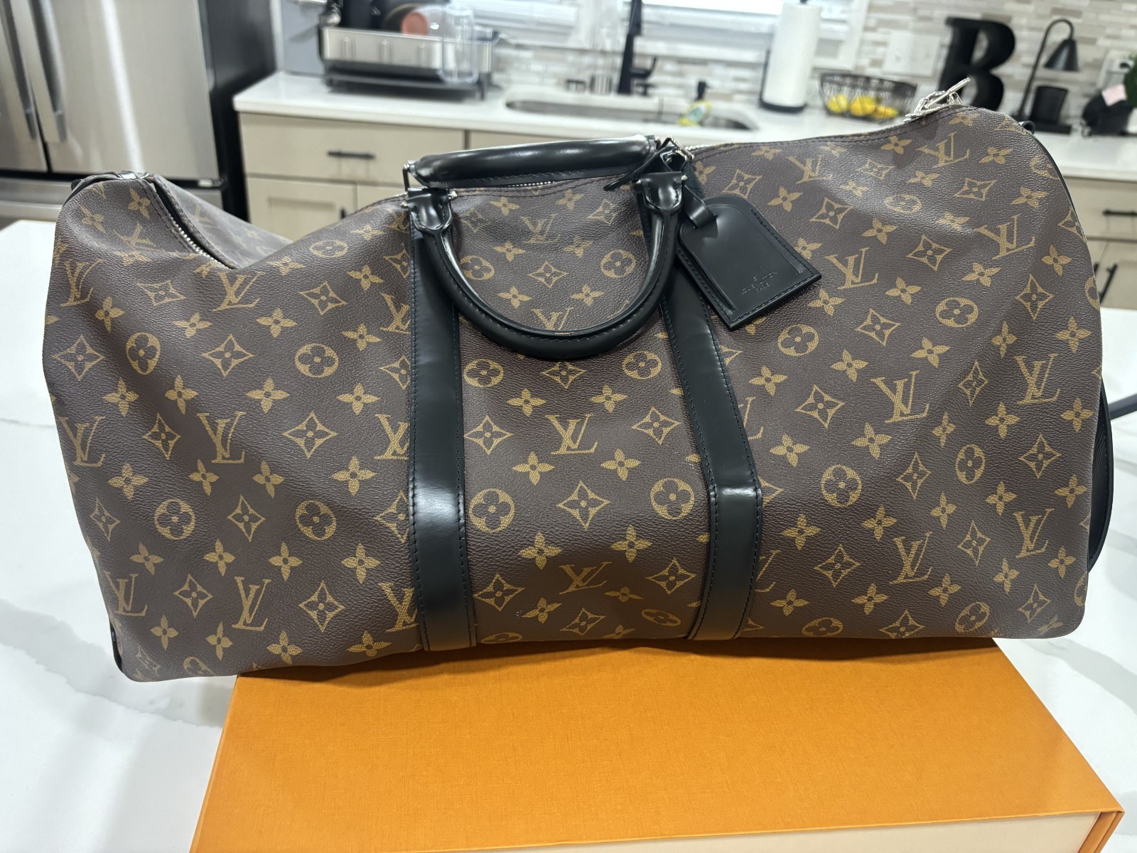 LOUIS VUITTON Keepall Bandoulière 55 in Monogram Macassar Canvas & Leather