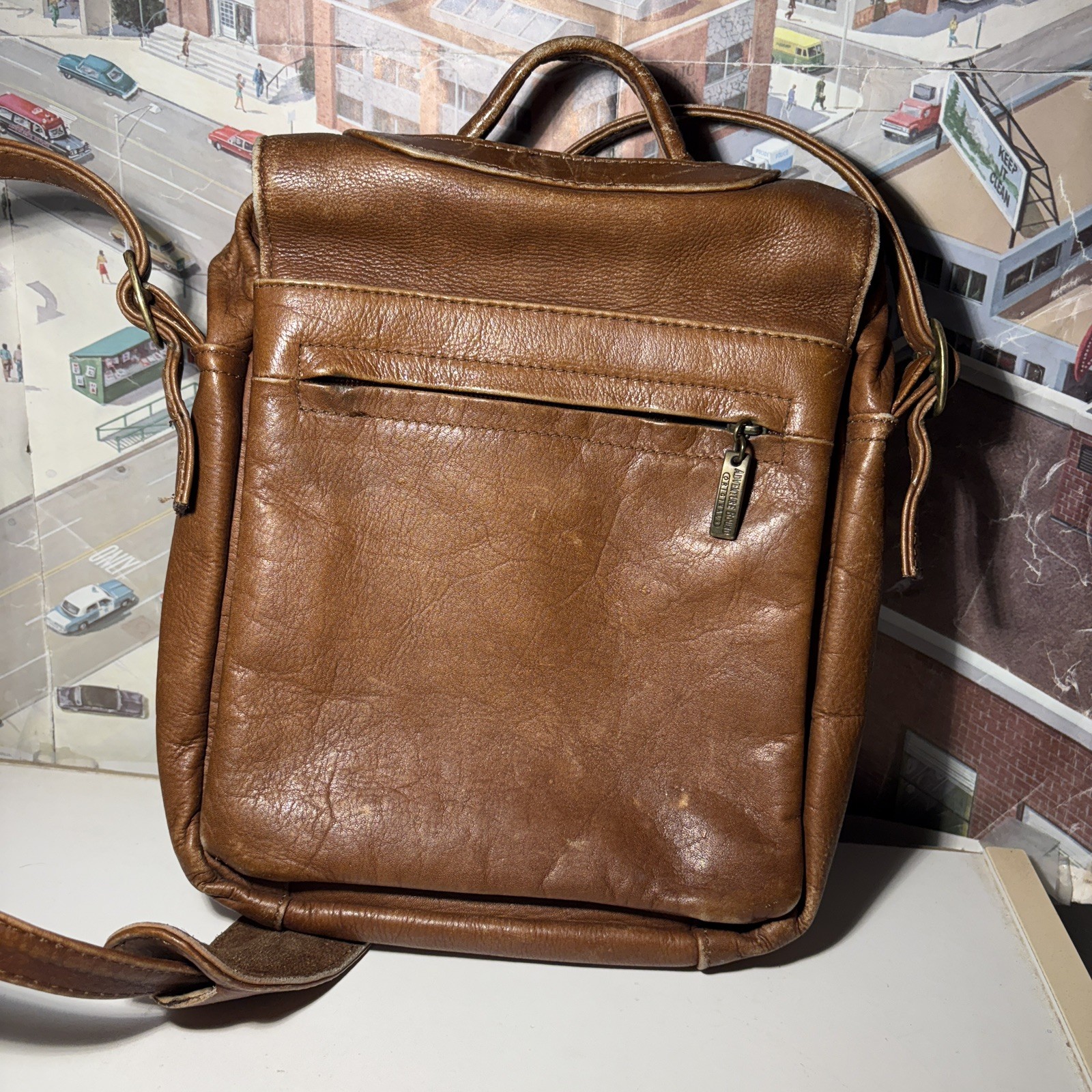Vintage Wilsons Leather Crossbody Bag with adjustable strap and five pockets