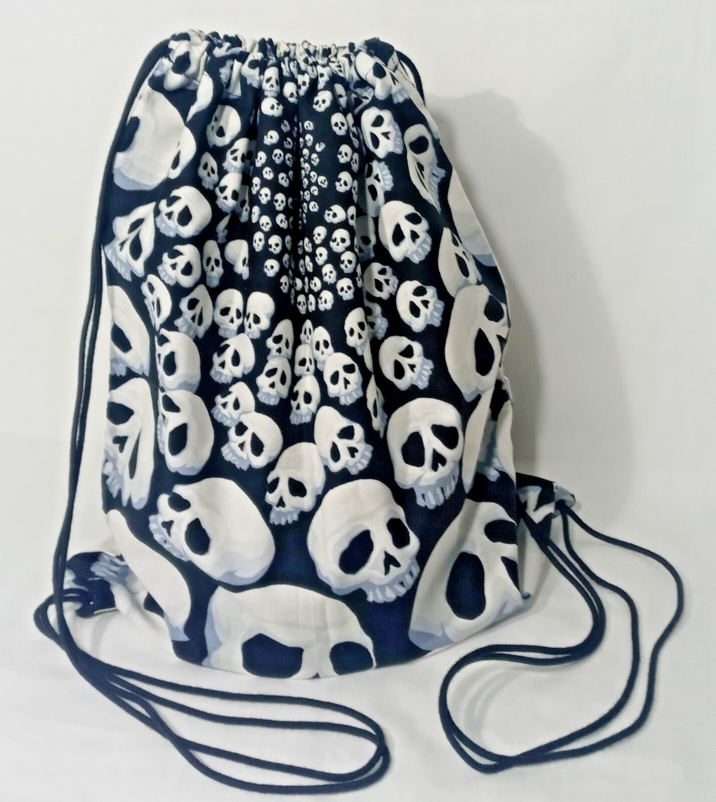 Handmade Lined Drawstring Backpack with Alexander Henry Skullfinity Cotton