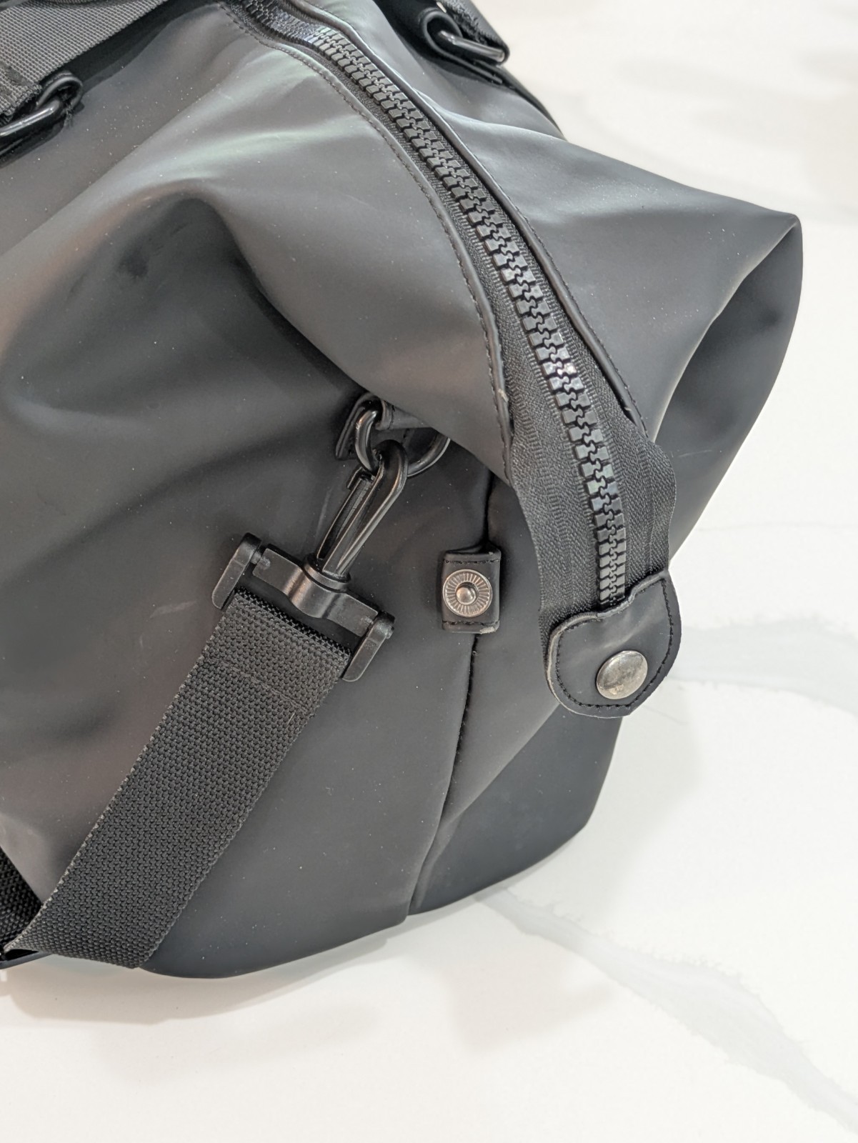 Duchamp London Rubberized Duffle Bag USB Cable Access in Black