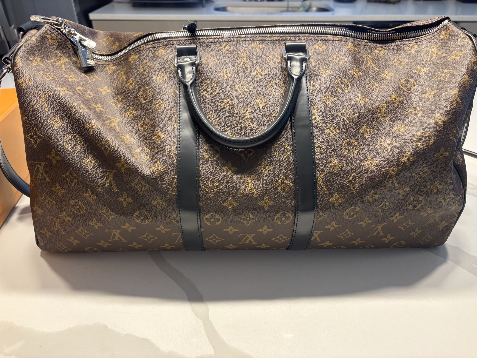 LOUIS VUITTON Keepall Bandoulière 55 in Monogram Macassar Canvas & Leather