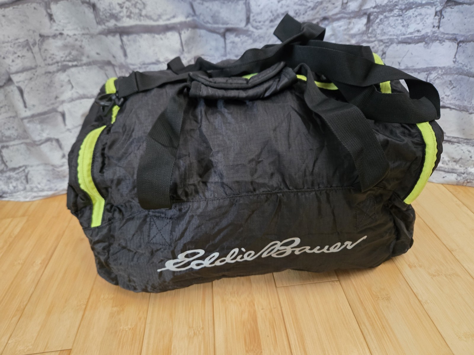 Eddie Bauer RIPPAC STOWAWAY DUFFLE BAG 40L 18×10 Black/Neon Trim Luggage Clean