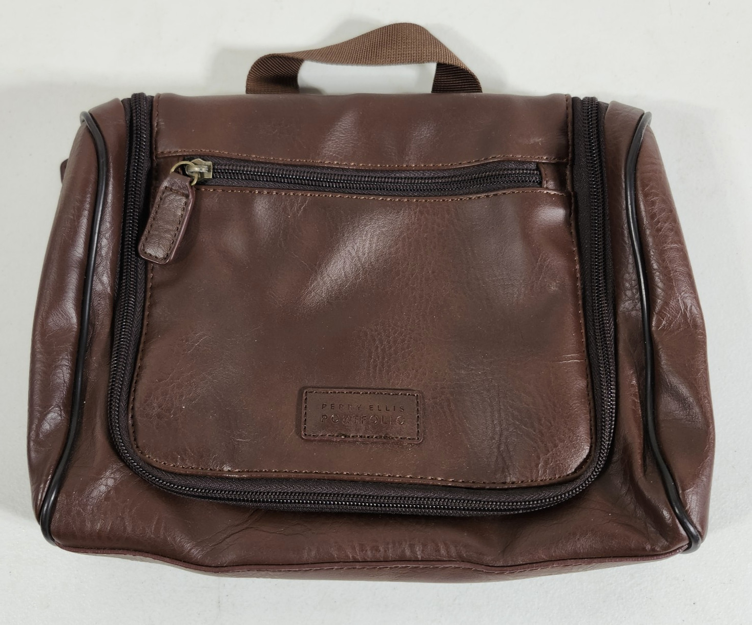 Perry Ellis Portfolio Toiletry Bag Brown Faux Leather 10″x7″
