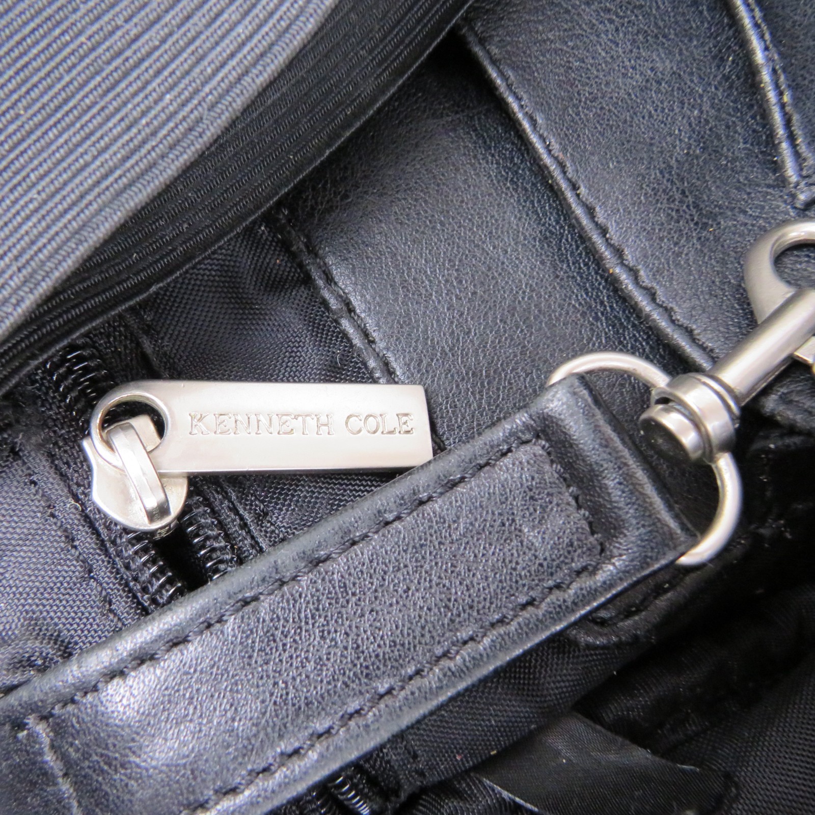 Kenneth Cole Black Leather Backpack Zipper Flap Padded Adjustable Straps Roomy