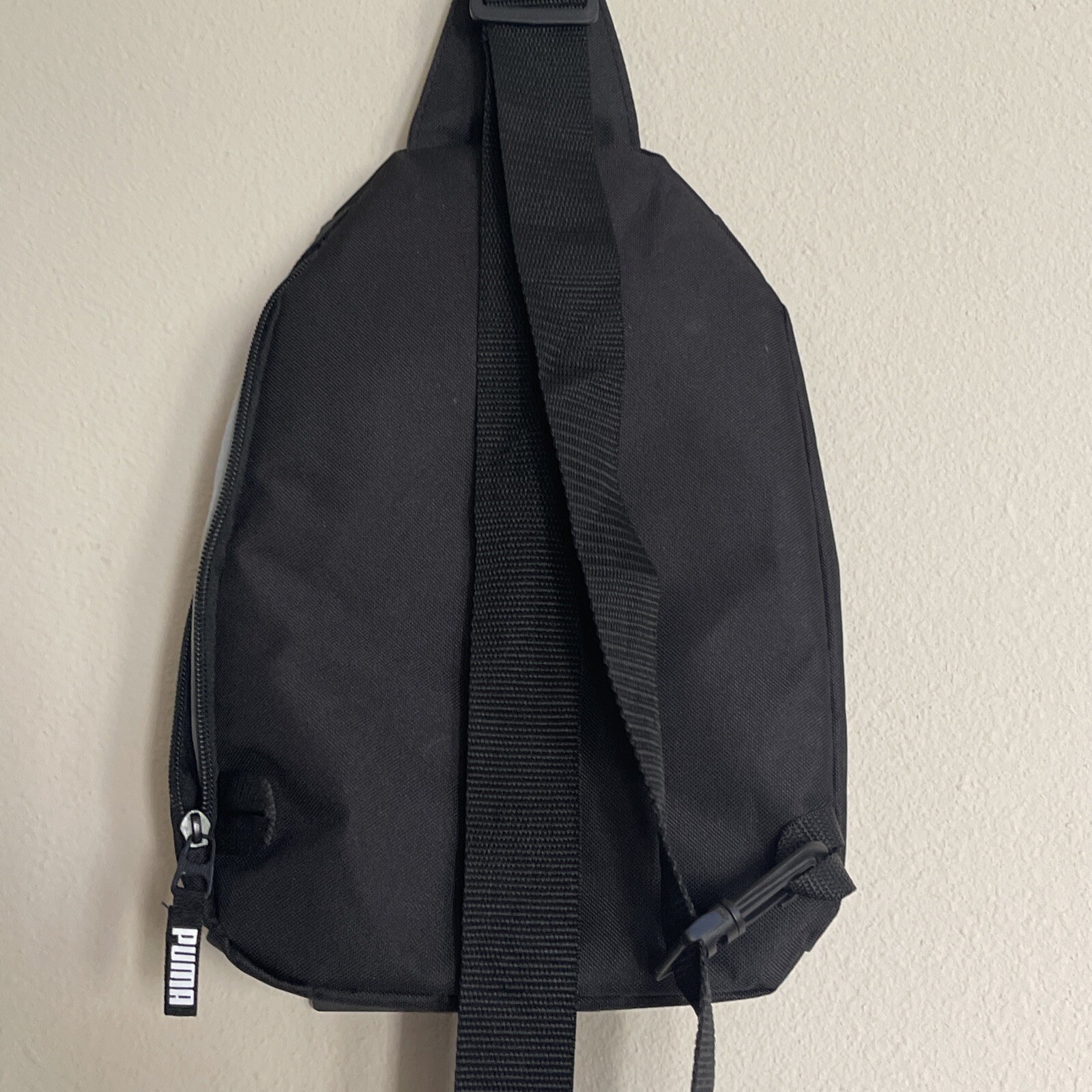 PUMA STRAP BACKPACK multiple Zip Pockets Sling Bag Sidewall Strap New With Tags!