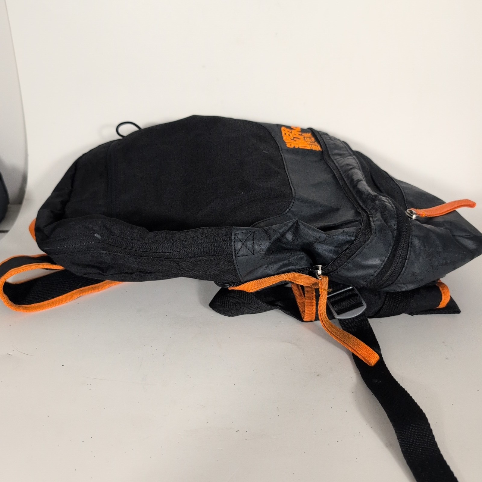 Superdry Tarp Backpack Black Orange Trim Travel Zip Pockets Water Resistant Bag