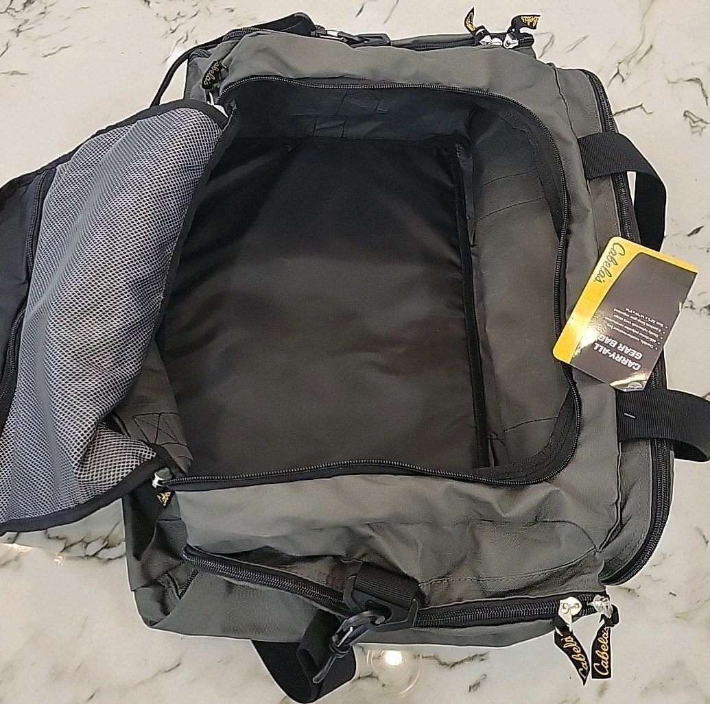 Cabela’s travel bag (6028). Zipper Closure. New. Gray Color. For Man Or Women.