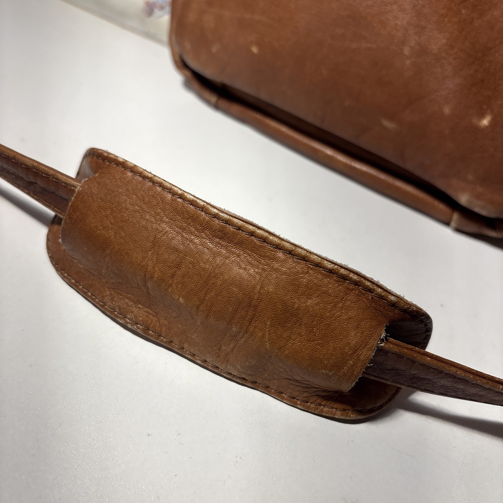 Vintage Wilsons Leather Crossbody Bag with adjustable strap and five pockets