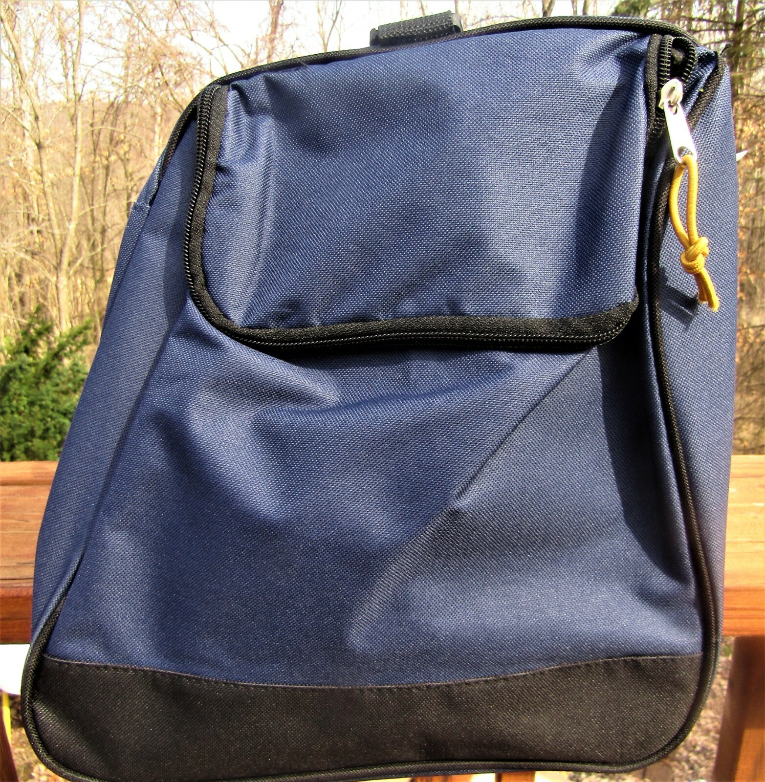 Trailmaker canvas duffel bag, blue and black, measures 24″ X 12X 11 1/2.
