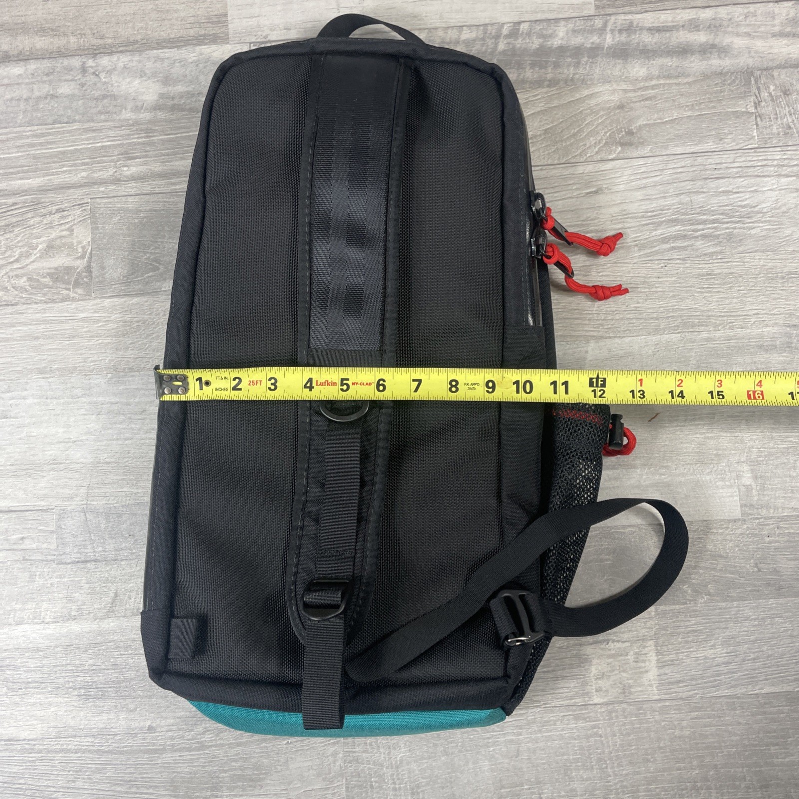 Topo Designs 13L Sling Bag Crossbody Pack with Laptop Sleeve in Black and Green