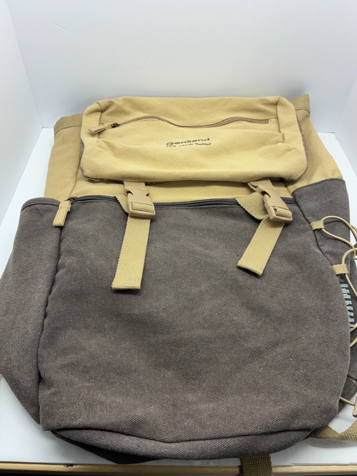 Leeds Canvas Laptop Backpack Tan Gray GenSend SEND Relief Promo Travel Rucksack