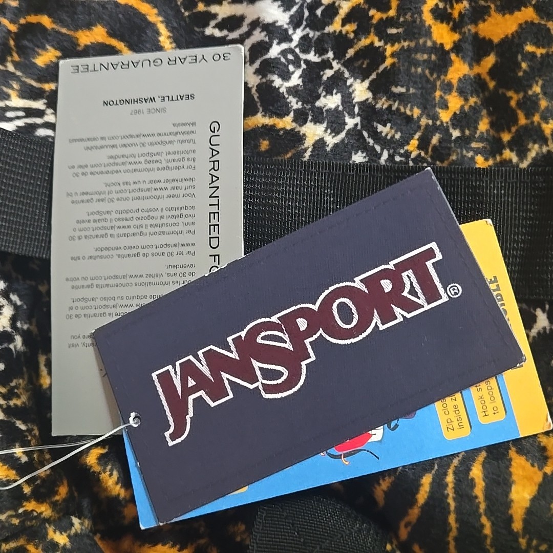 NWTs Jansport Inner Beast Reversible Duffel White Brown Tiger / Red
