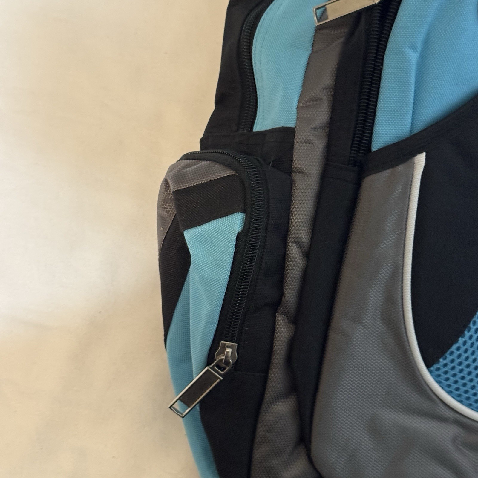 Blue & Black Multi-Pocket Backpack – Audio Port – Lightweight & Durable