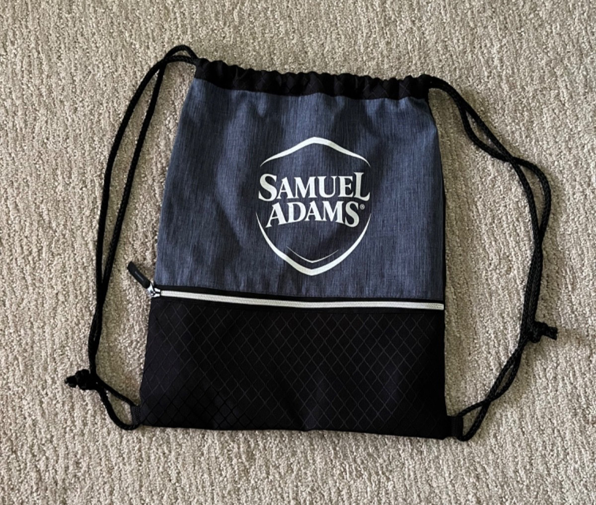 Samuel Adams Heather Navy/Black Drawstring Backpack Front Zip Pocket Logo