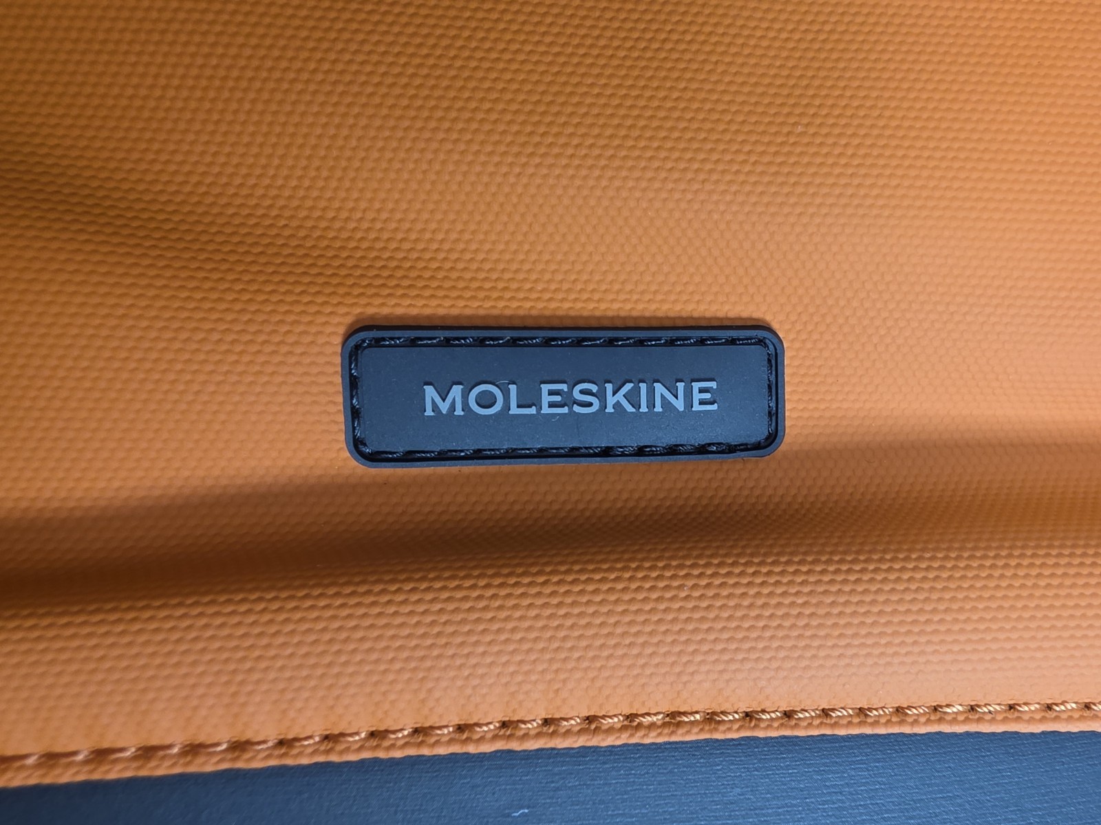 Moleskine Nomad Medium Backpack — Striking Orange with Molded Black Base