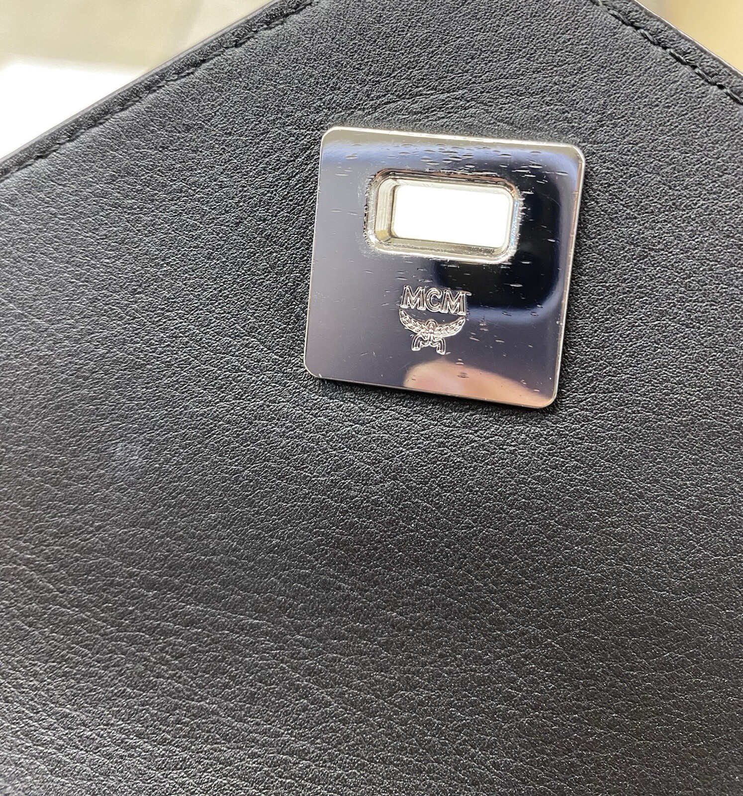 MCM Essential Monogram Leather Small Backpack In Charcoal 10×8.5×4.5 Dark Brown