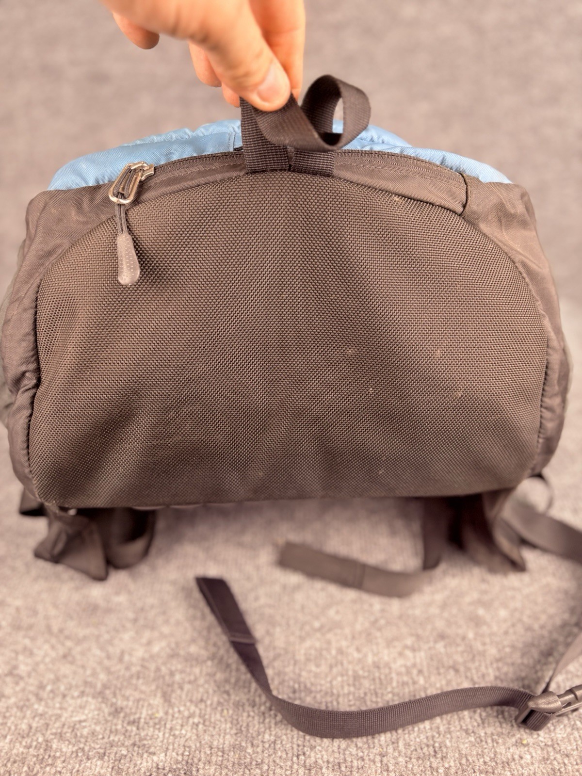 The North Face Surge Backpack Sky Blue Front Grey Back And Green Side Pockets