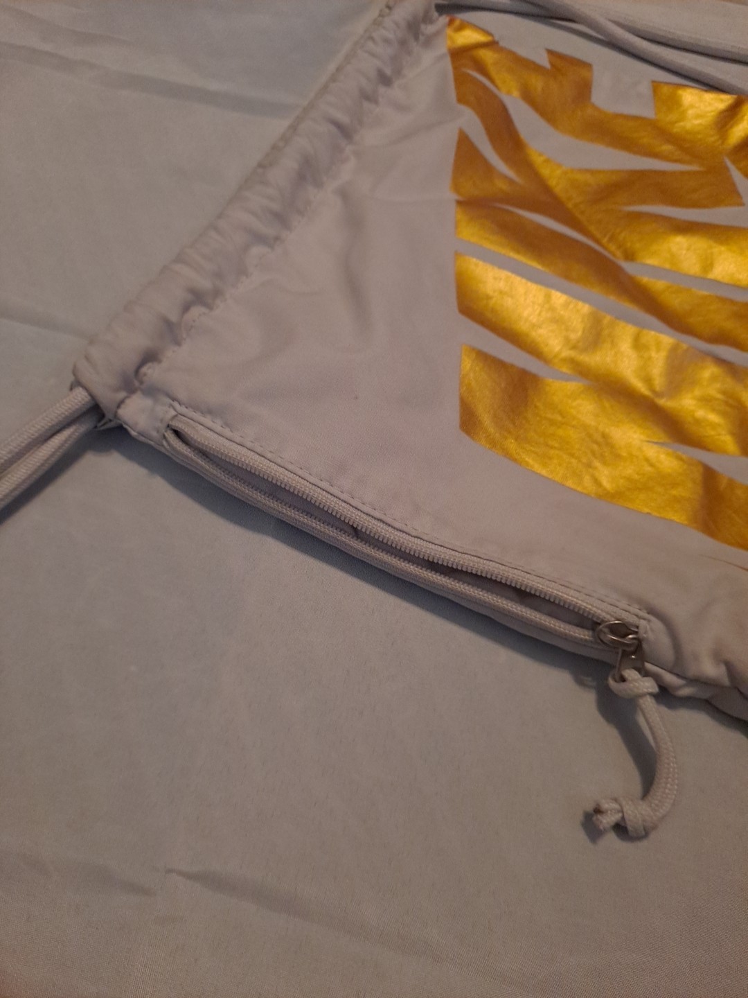 Nike Cinch Sack Pack Drawstring Backpack | Eggshell White W/ Gold Text