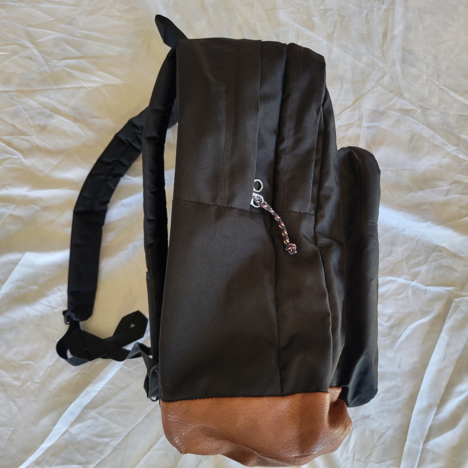 JanSport JS0A2SDD008 Cool Student Backpack – Black Faux Leather Bottom
