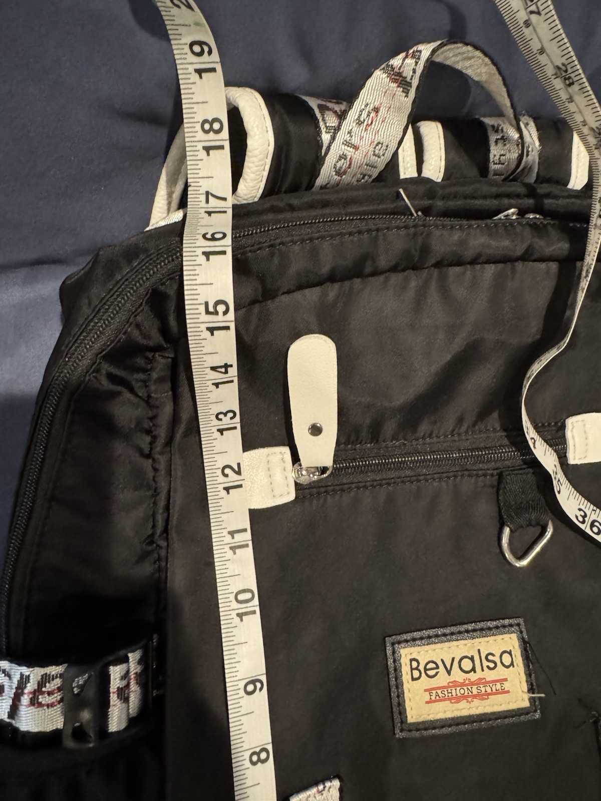 Bevalsa Black White Backpack with USB Port, Audio Pocket, Adjustable Straps