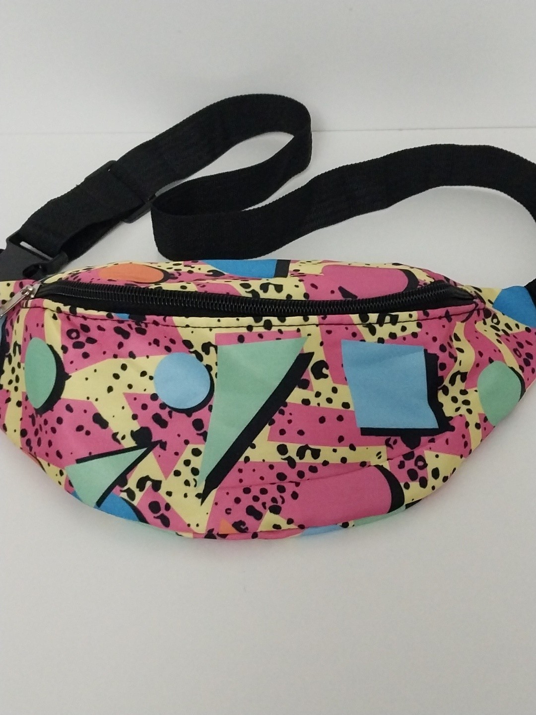 80s or 90s style Memphis pattern fanny pack with a black adjustable strap and…