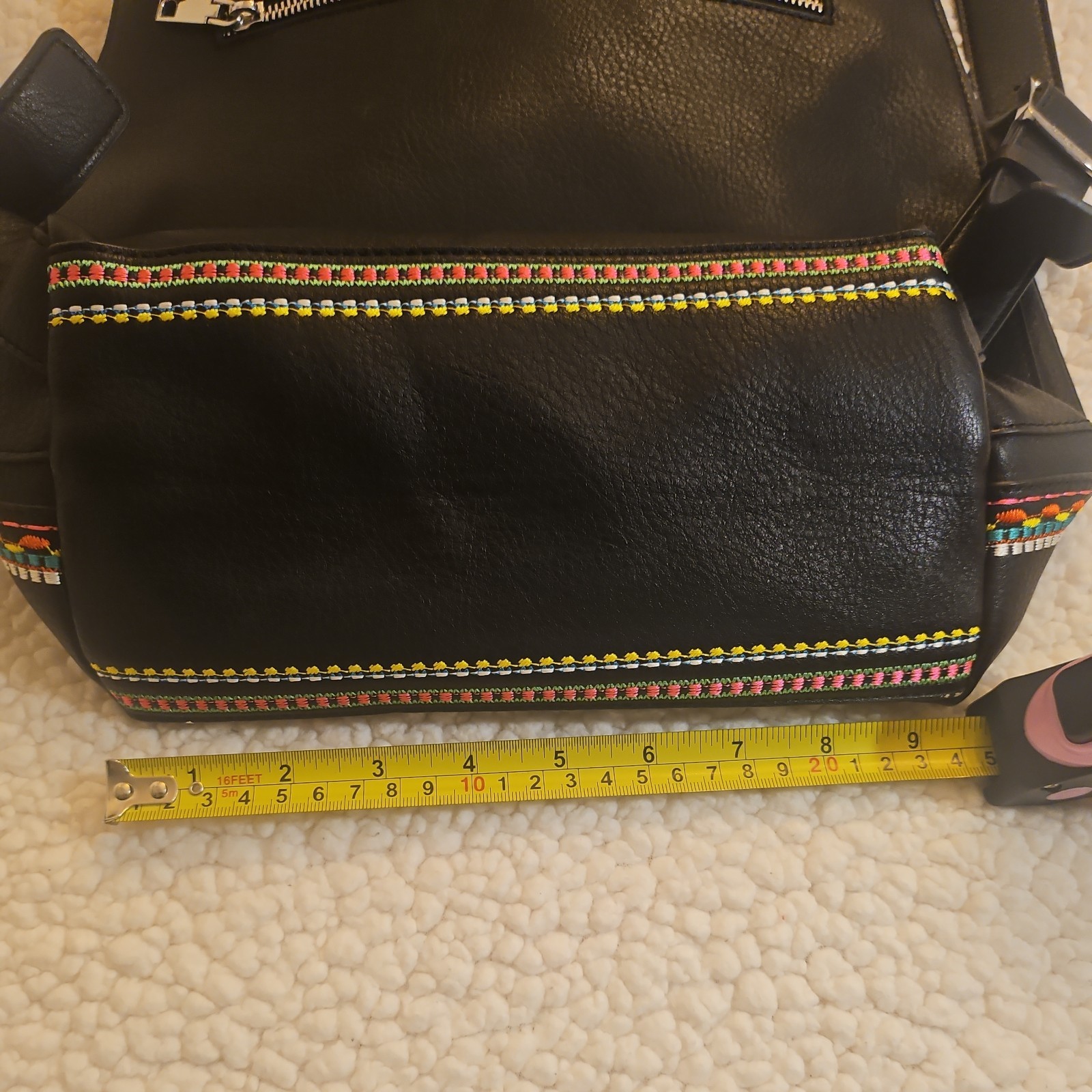 Midsize backpack,multicoloured embroidery,magnetic flap closure, zip, pockets.