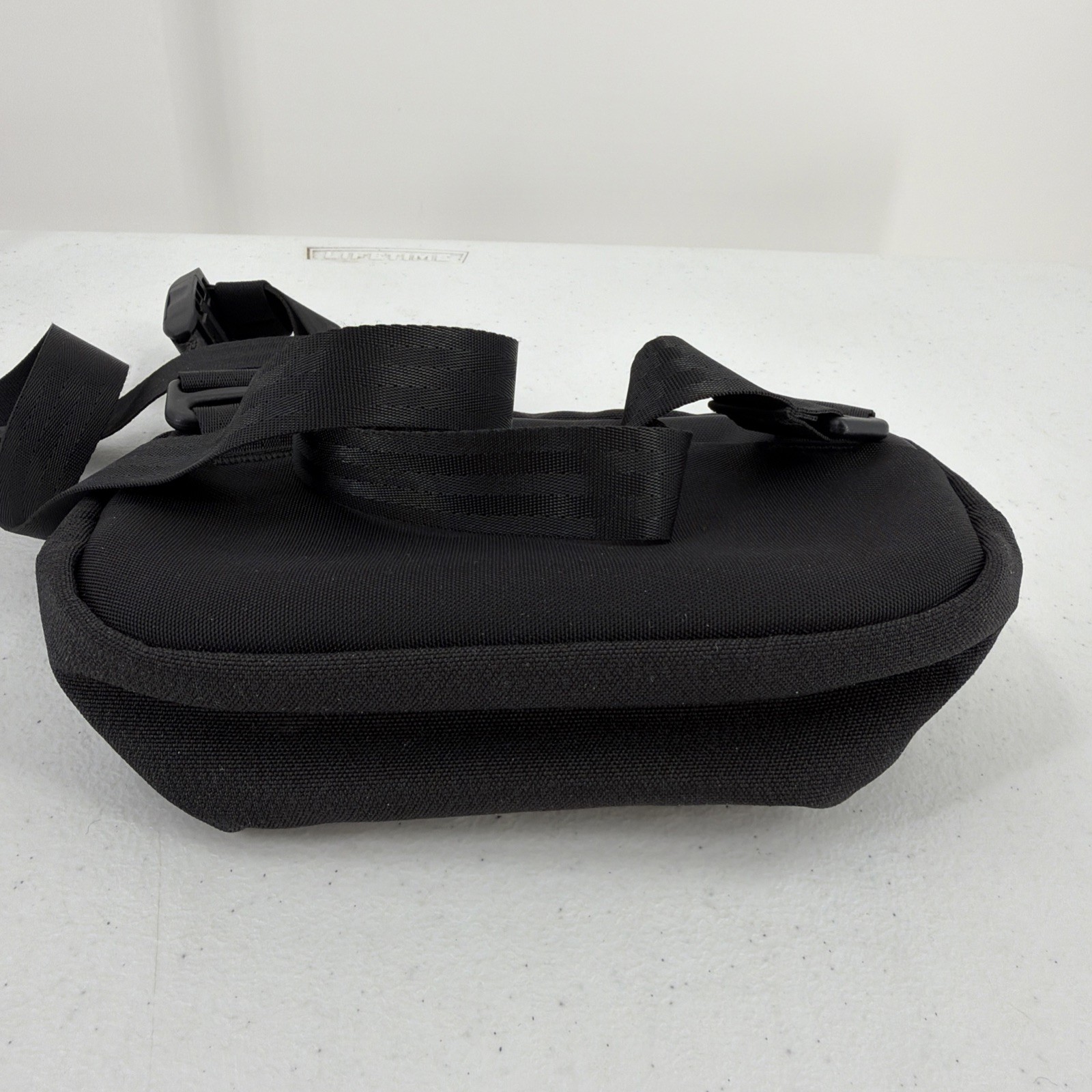 Alpaka Sling Bag Black Pockets Zip Adjustable Clean