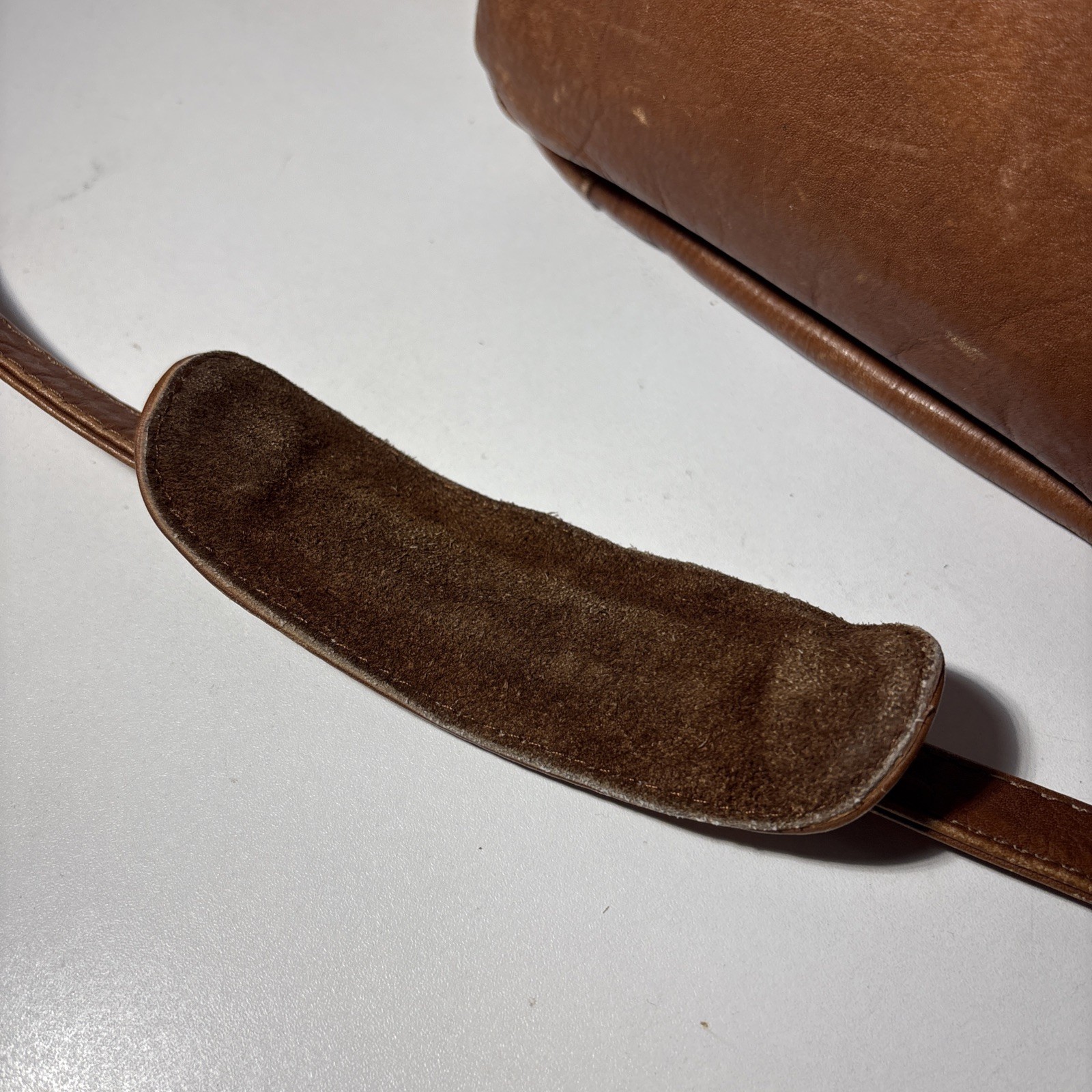 Vintage Wilsons Leather Crossbody Bag with adjustable strap and five pockets