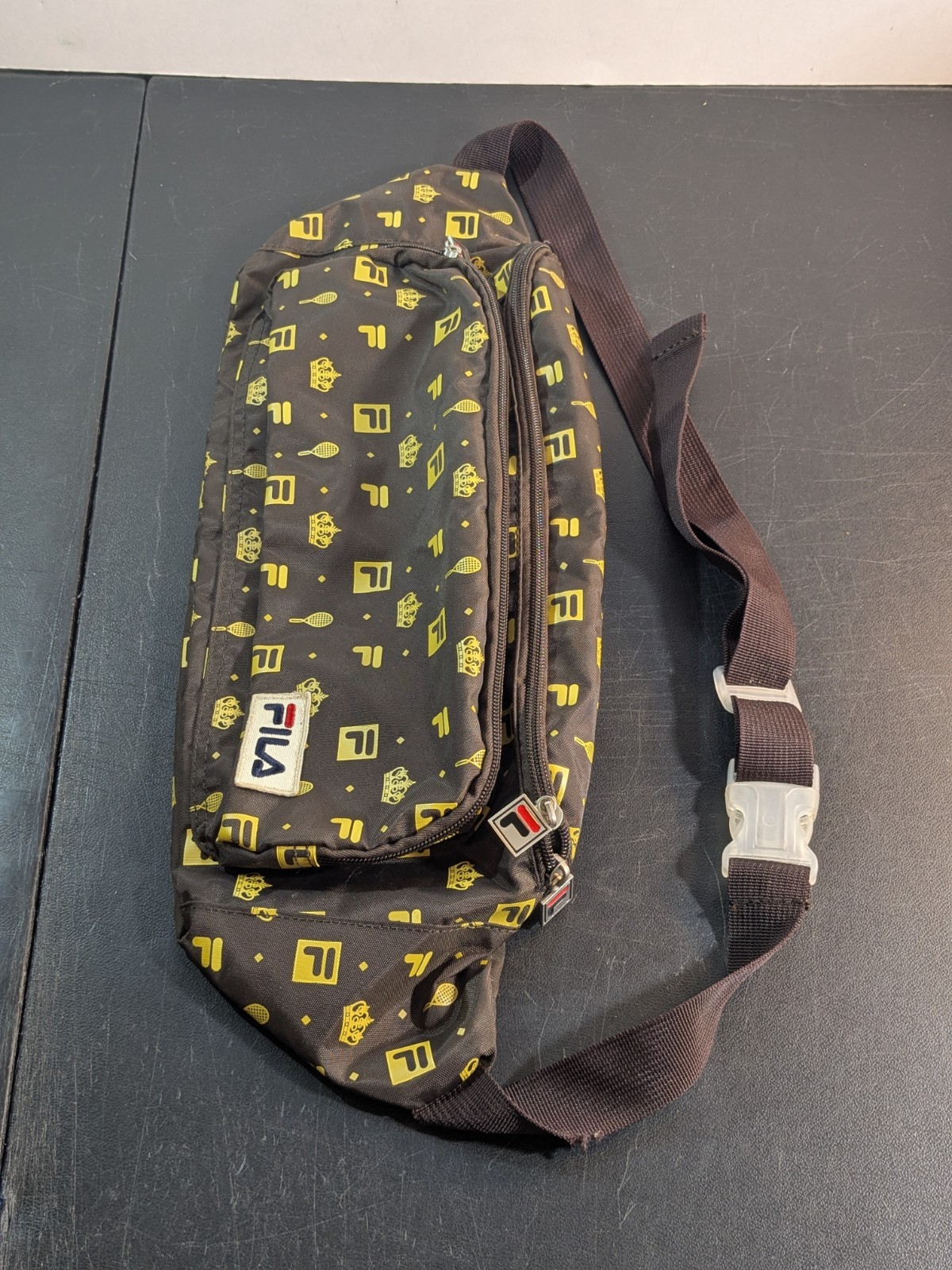 FILA + Urban Outfitters Monogram Sling Bag | 20″x7″x5″ Fanny Pack