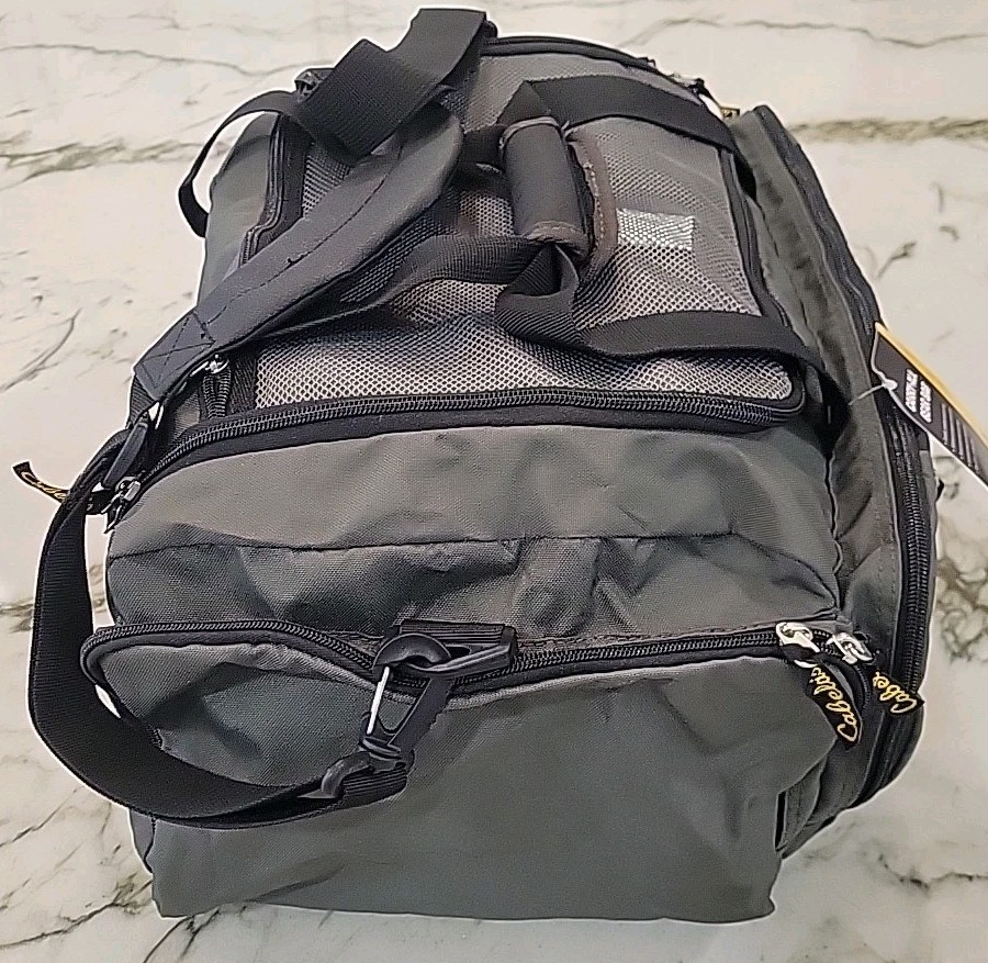 Cabela’s travel bag (6028). Zipper Closure. New. Gray Color. For Man Or Women.