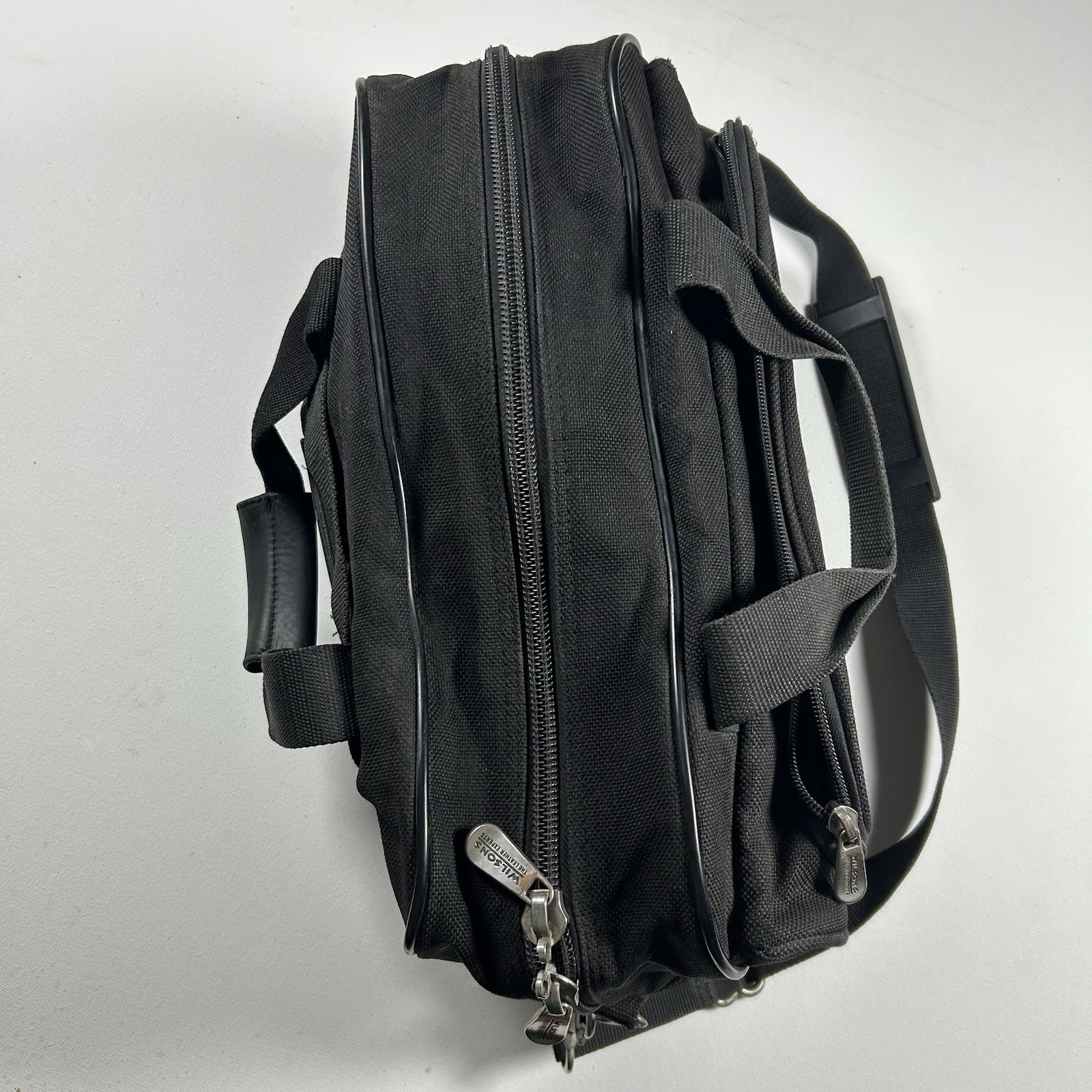 Vtg Wilsons Leather Duffle Bag Black Travel Weekend Carry On Zip Shoulder Strap
