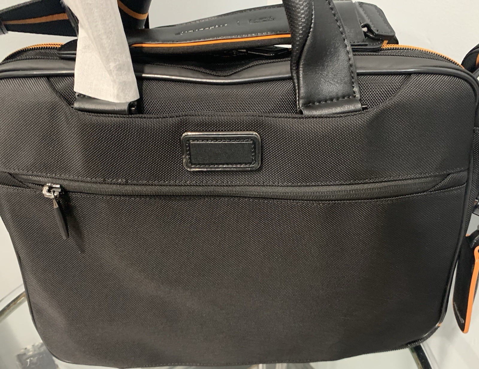 TUMI MCLAREN Axle Slim Brief $1095 Black/Orange
