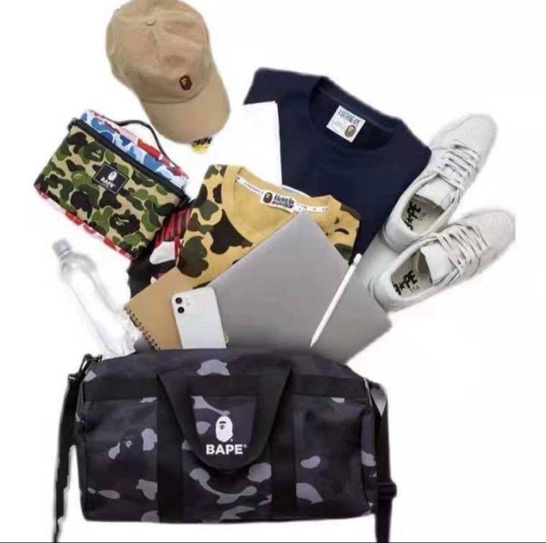A BATHING APE BAPE Black CAMO Duffel Bag SPRING Collection 2022 book appendix