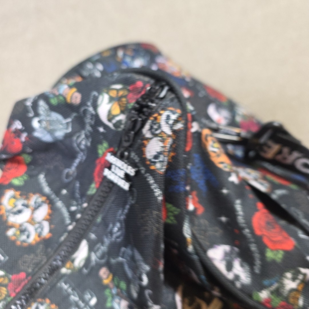 A**holes Live Forever Emotional Baggage Duffel Bag Skull Bottle All-Over Print