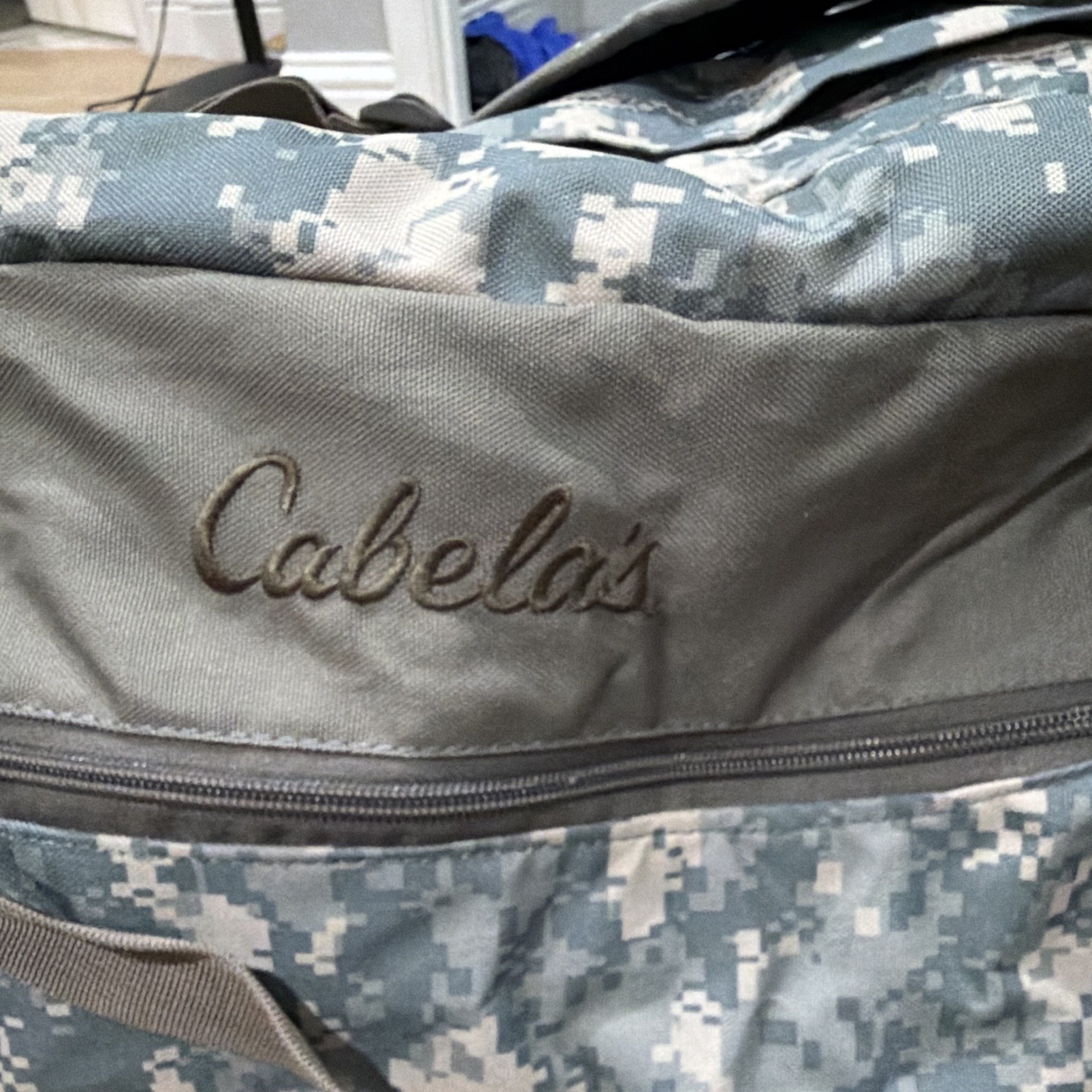 Cabela’s Camouflage Duffle Bag Gray Blue Zip Buckle Shoulder Strap Pockets