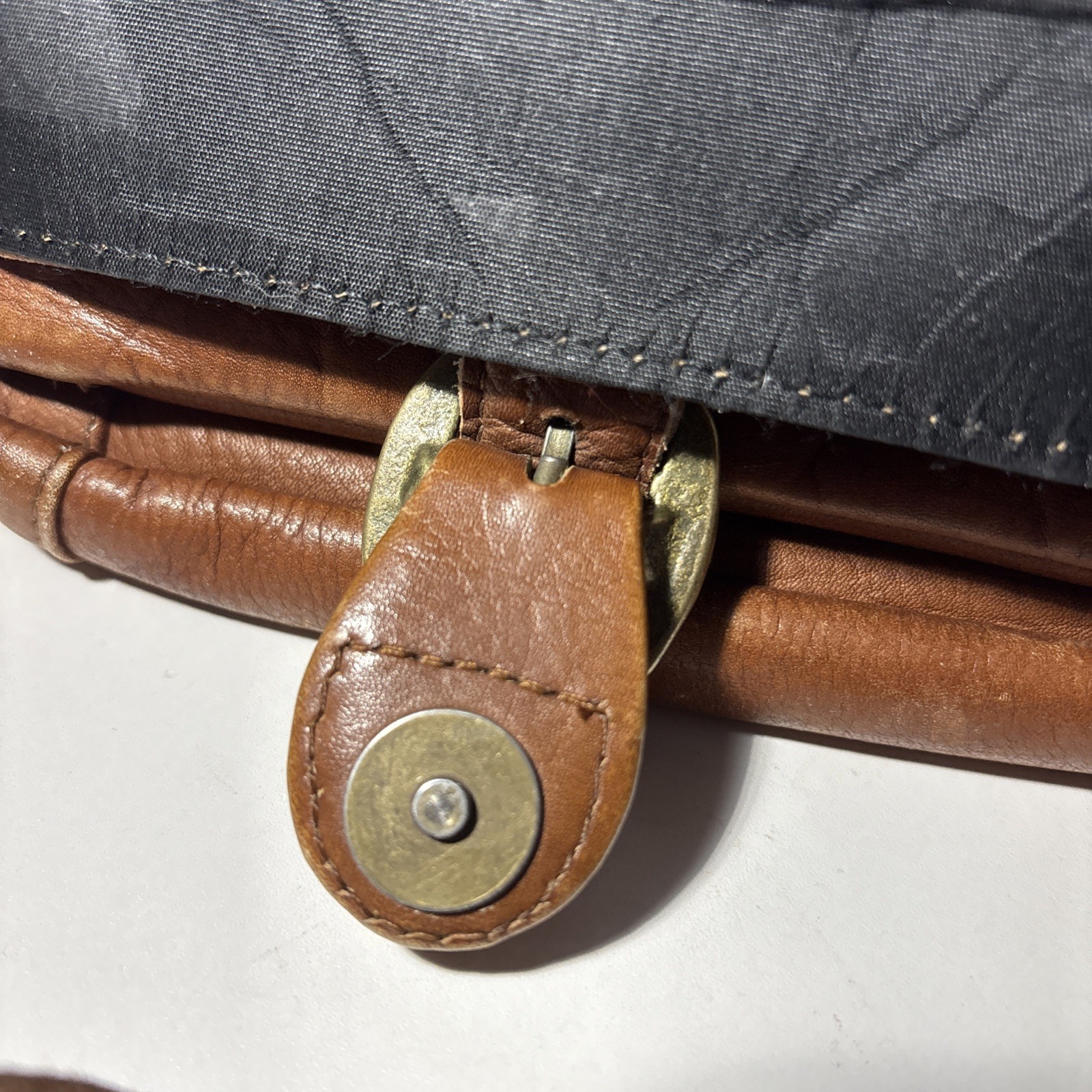 Vintage Wilsons Leather Crossbody Bag with adjustable strap and five pockets