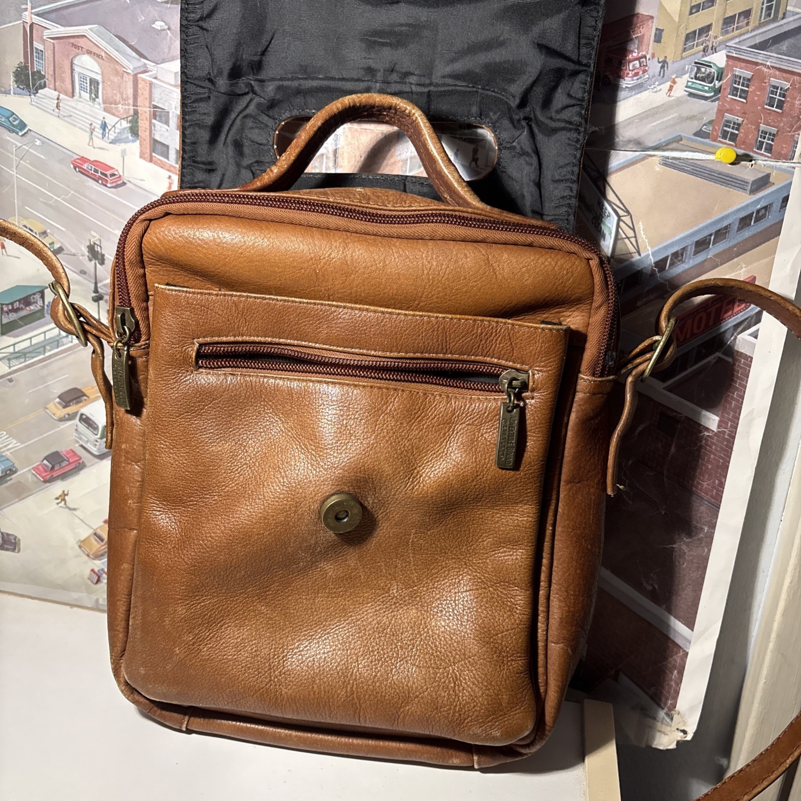 Vintage Wilsons Leather Crossbody Bag with adjustable strap and five pockets