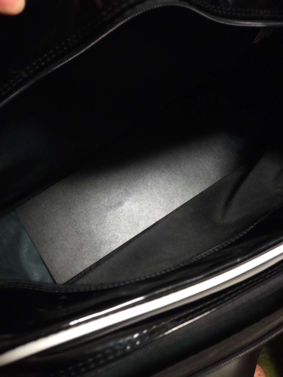 Glossy black enameled bag shiny thick vinyl outside IGNIO sports