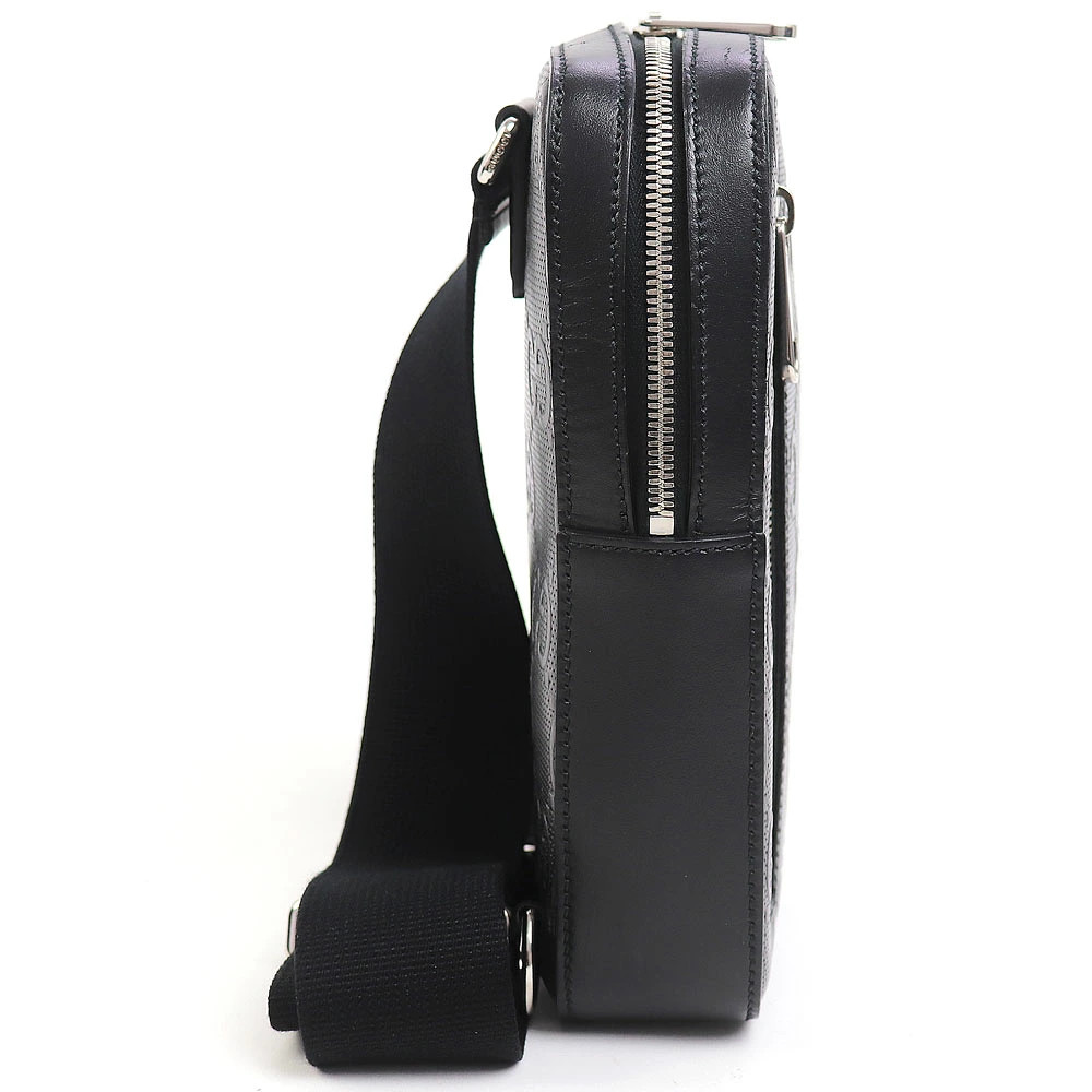 Gucci GG Embossed Sling Backpack Black Perforated Leather Crossbody Shoulder Bag