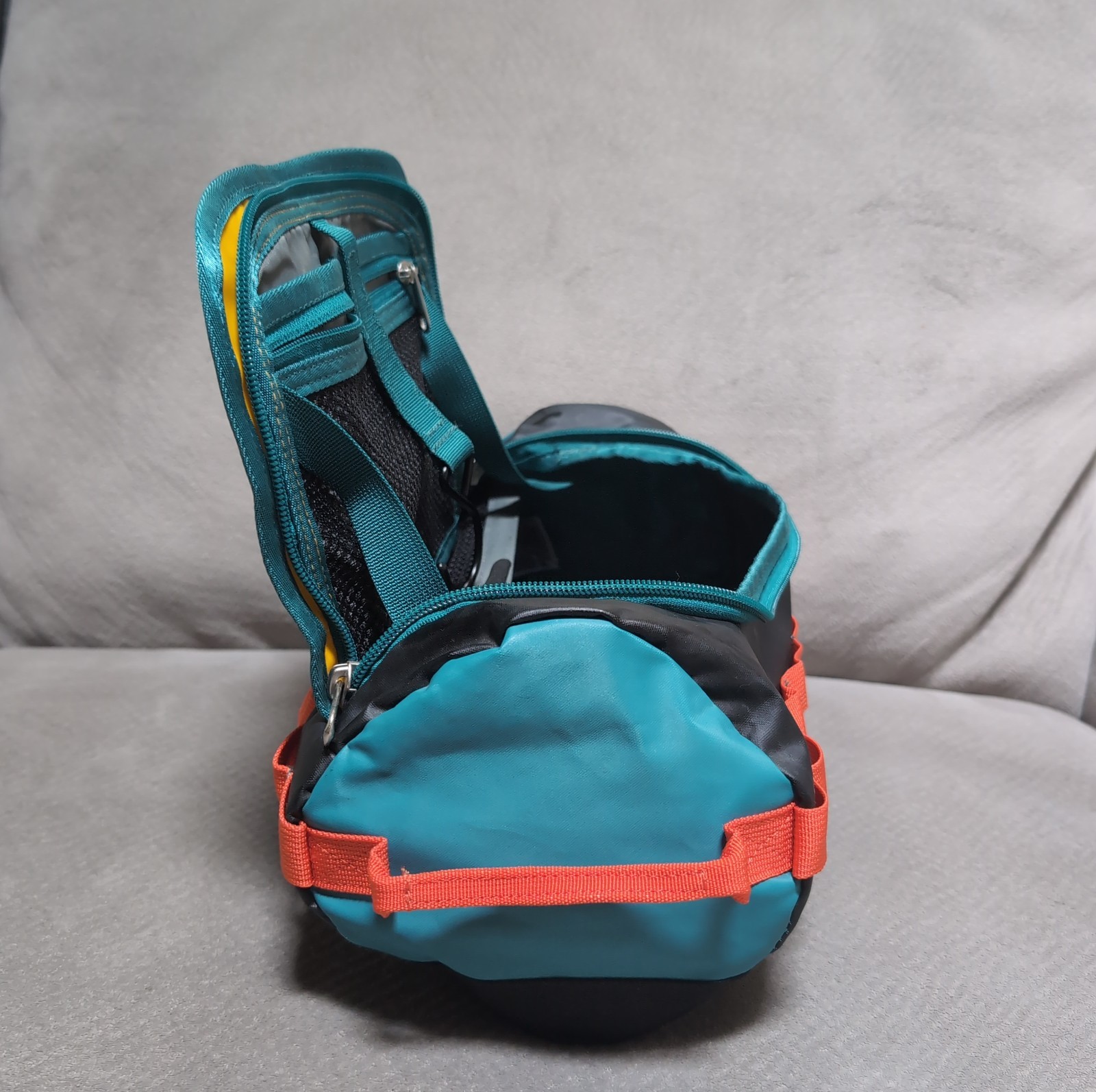 The North Face Base Camp Travel Canister L Black Orange Teal Yellow