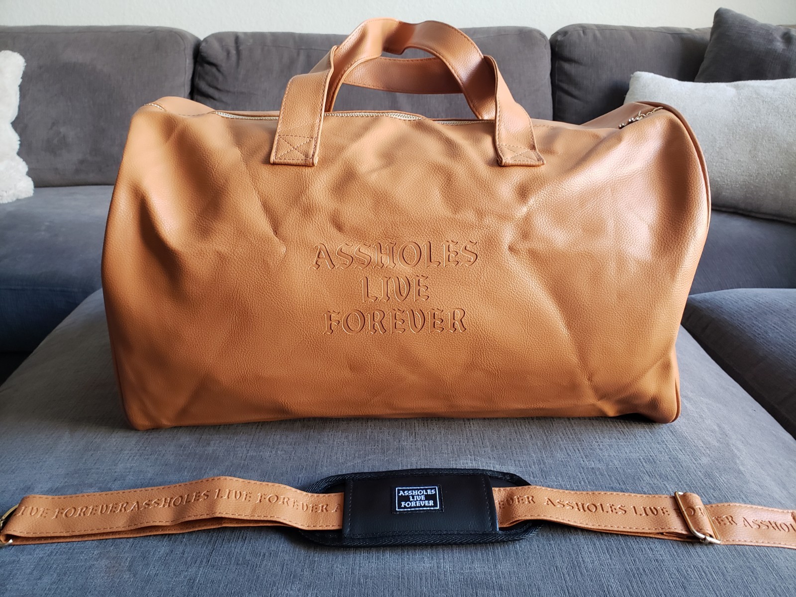 ASSHOLES*S LIVE FOREVER – Emotional Baggage Camel Tan Faux Leather BRAND NEW!