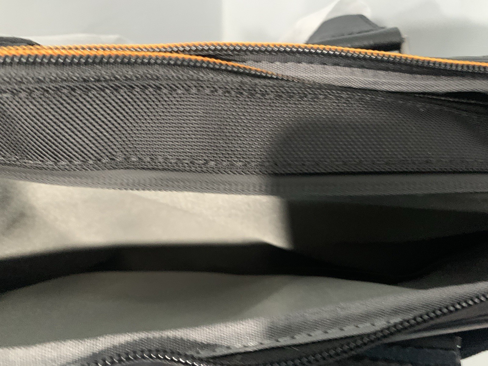 TUMI MCLAREN Axle Slim Brief $1095 Black/Orange
