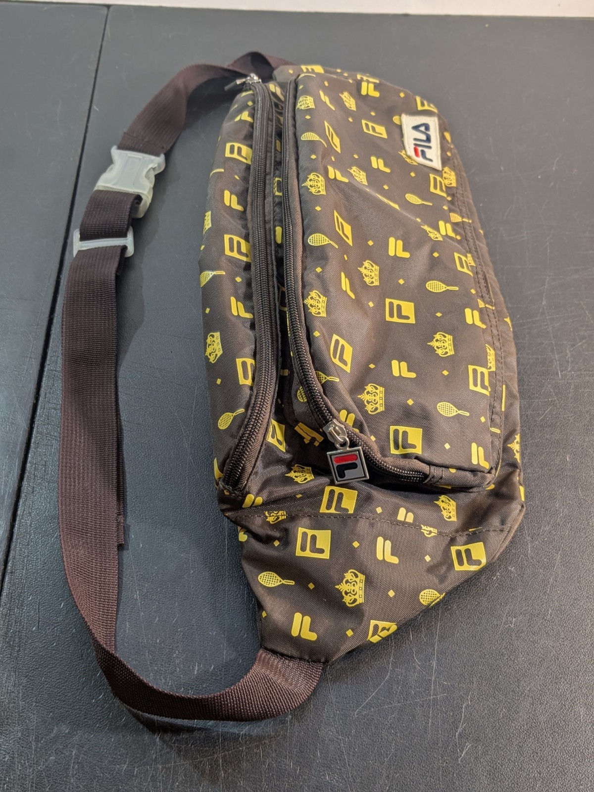 FILA + Urban Outfitters Monogram Sling Bag | 20″x7″x5″ Fanny Pack