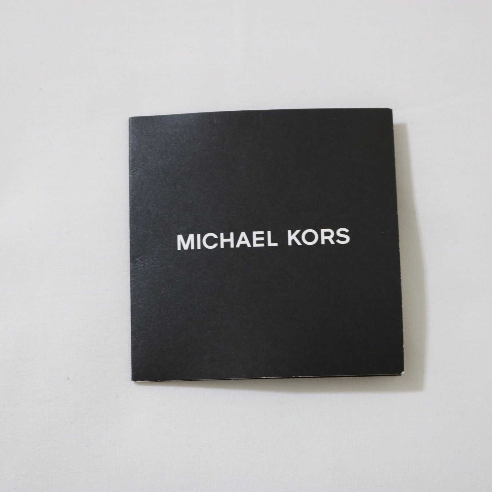 Michael Kors Men Cooper Medium Signature Logo Sling Bag new with tags