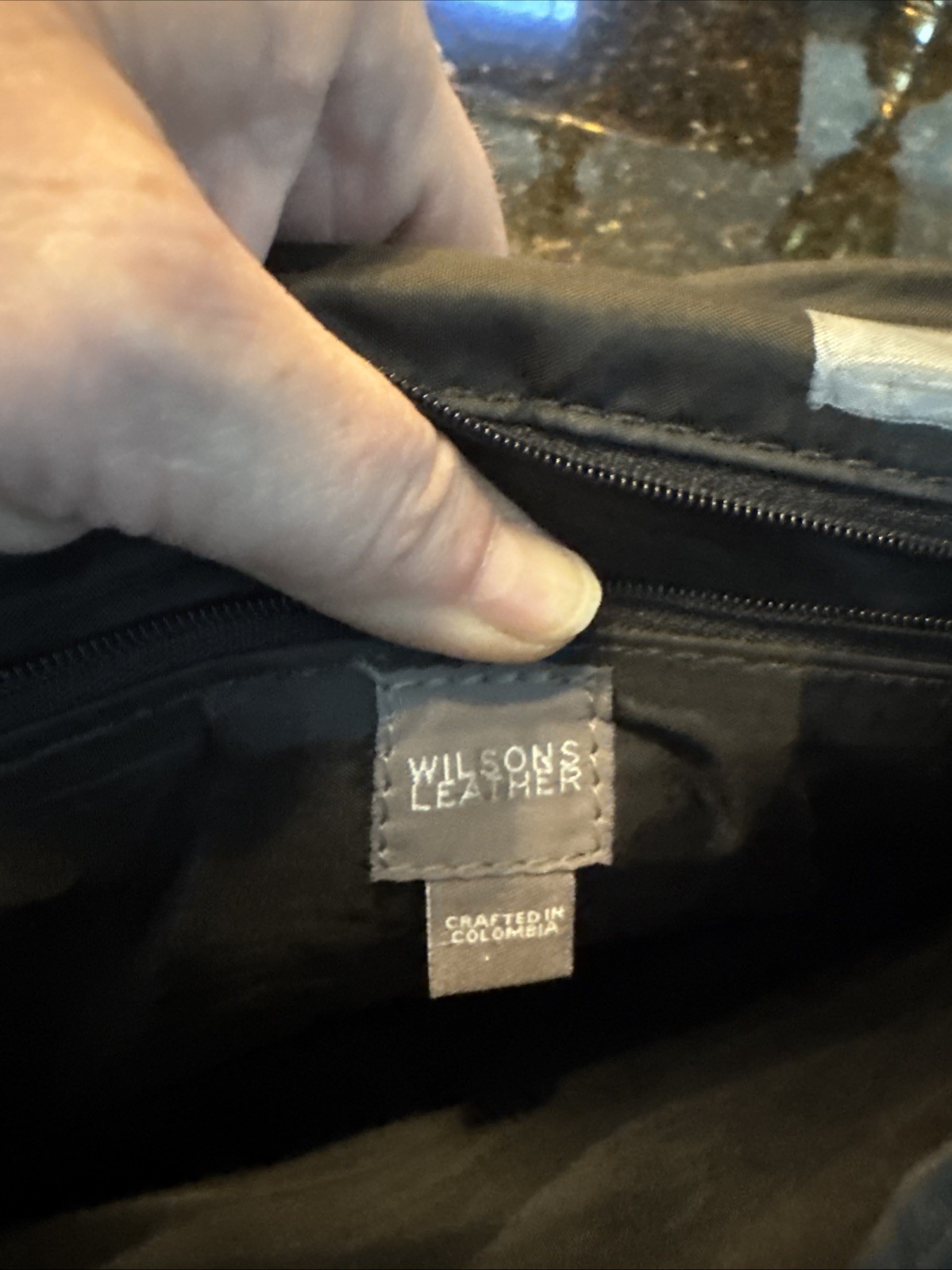 Wilson’s Black Genuine Leather Messenger Bag. Great Condition