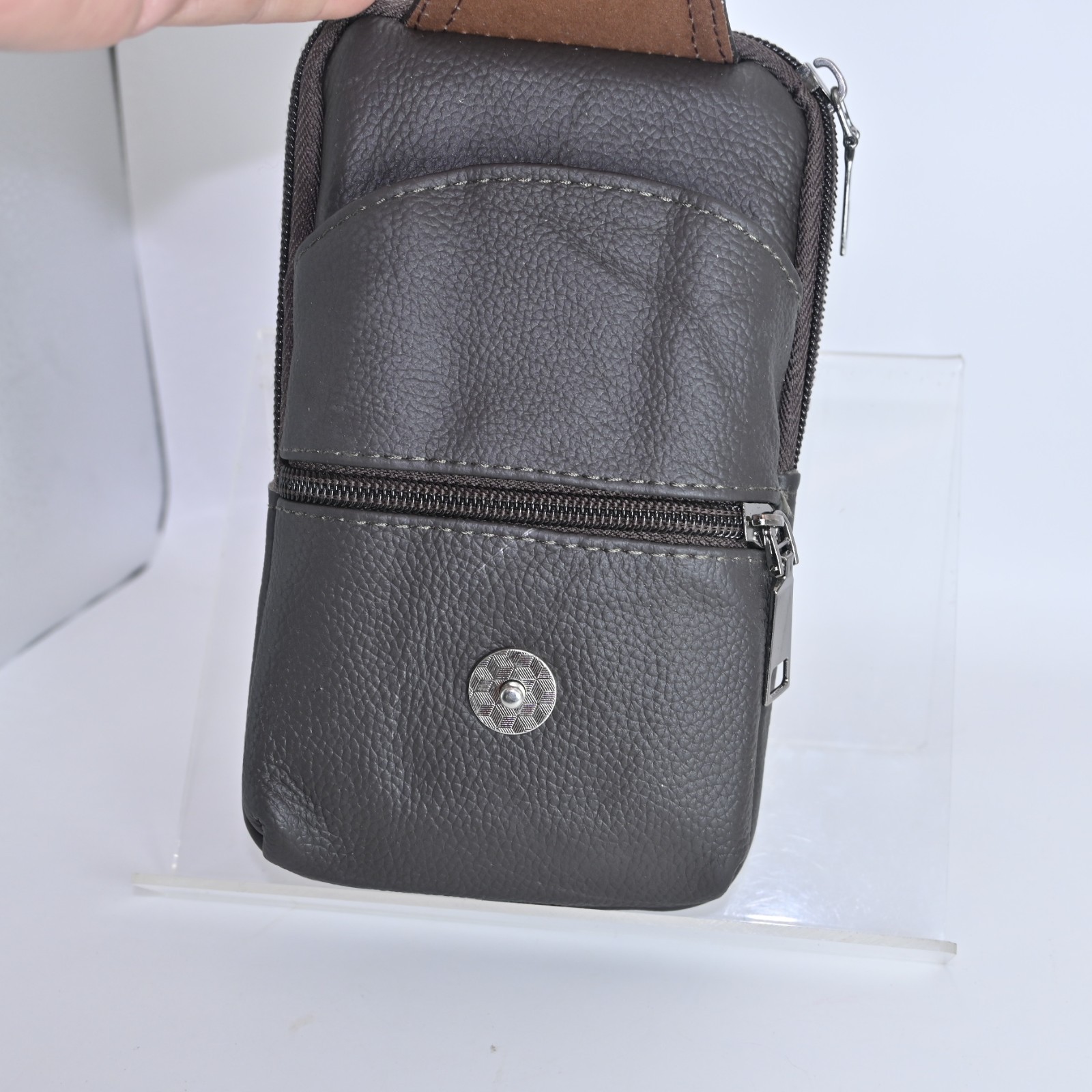 Brown small purse has carabiner hook go thru belt loop magnetic snap/pockets