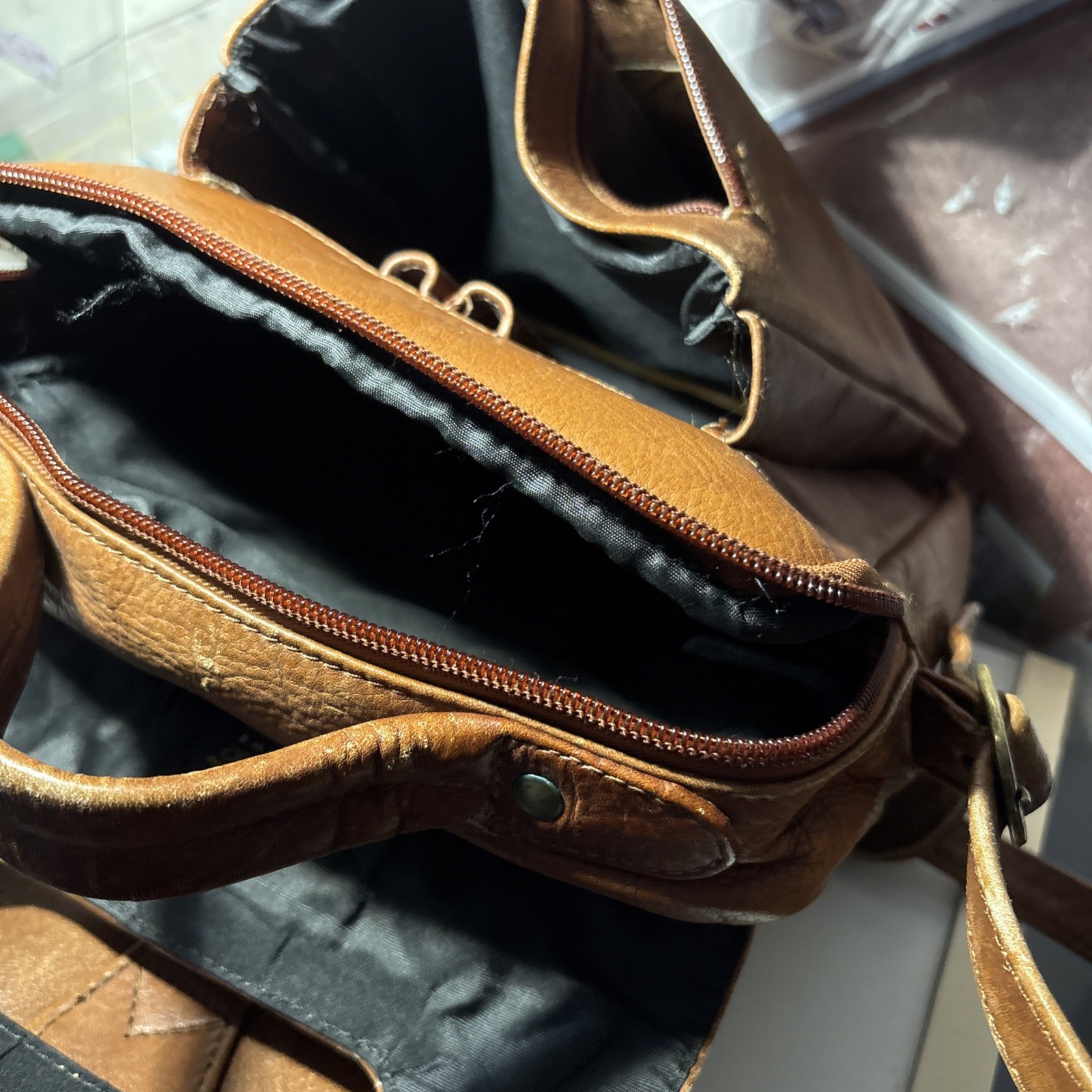 Vintage Wilsons Leather Crossbody Bag with adjustable strap and five pockets