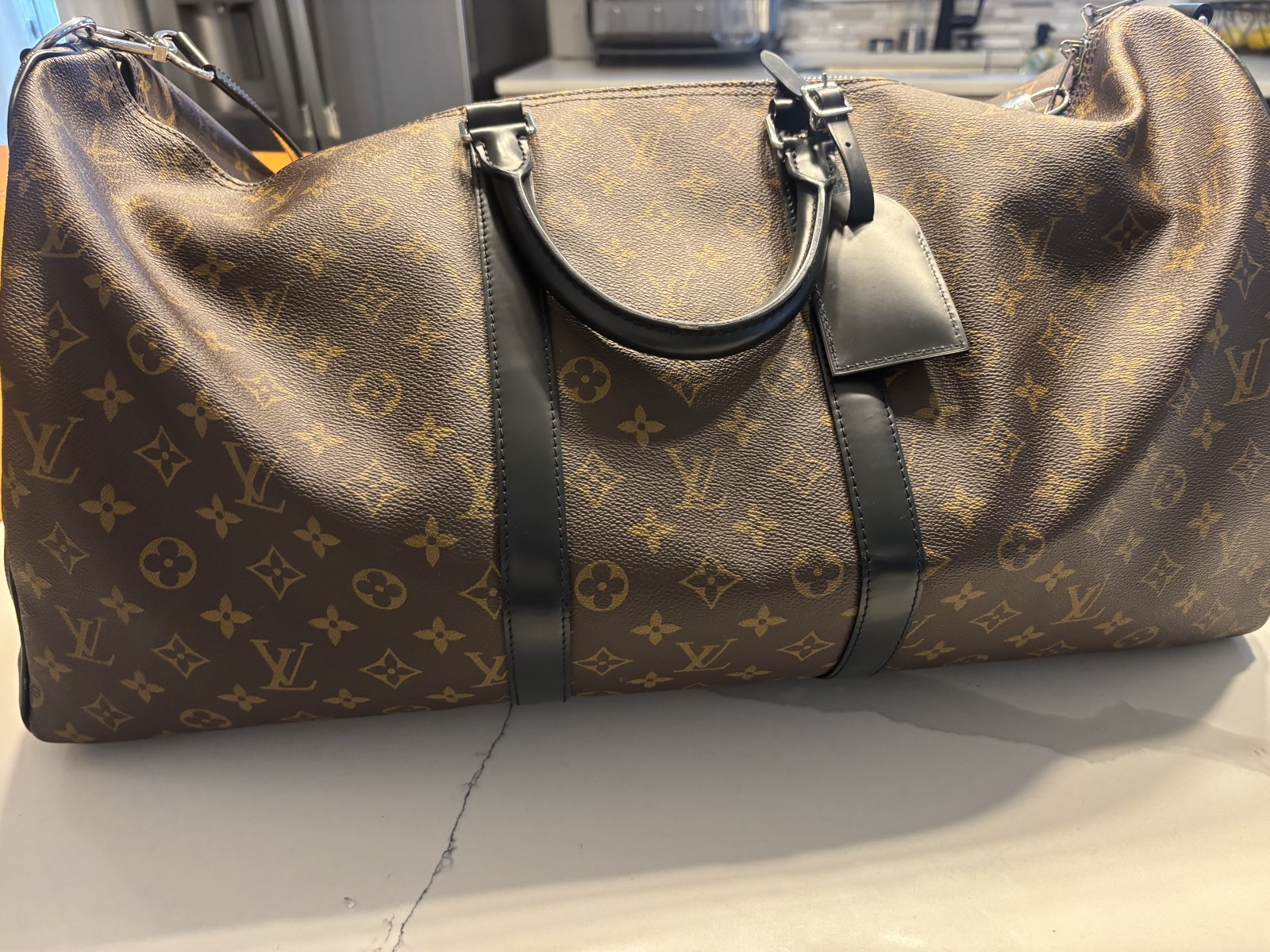 LOUIS VUITTON Keepall Bandoulière 55 in Monogram Macassar Canvas & Leather