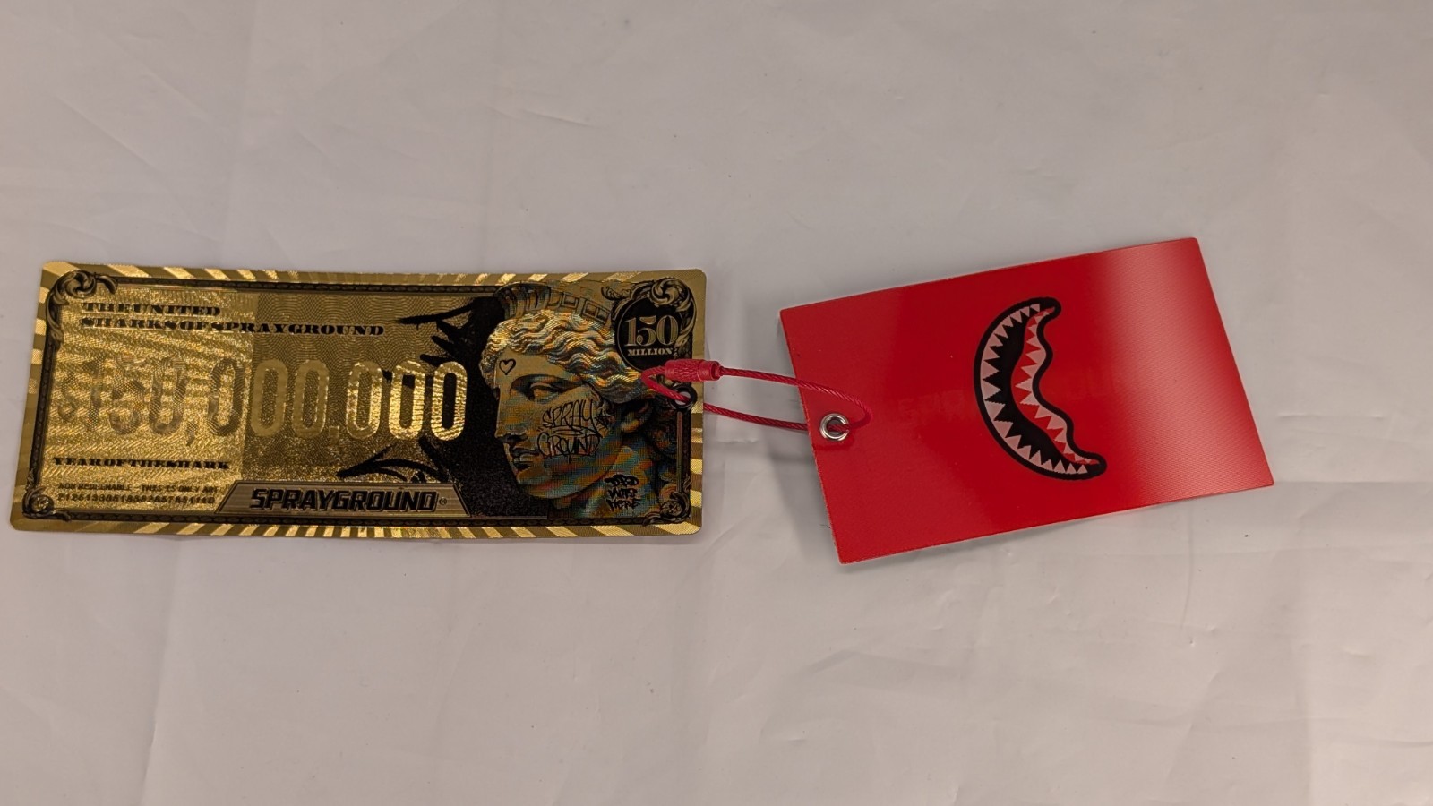 Limited Edition Sprayground $150 Million Year of the Shark Bill Tags Gold & Red