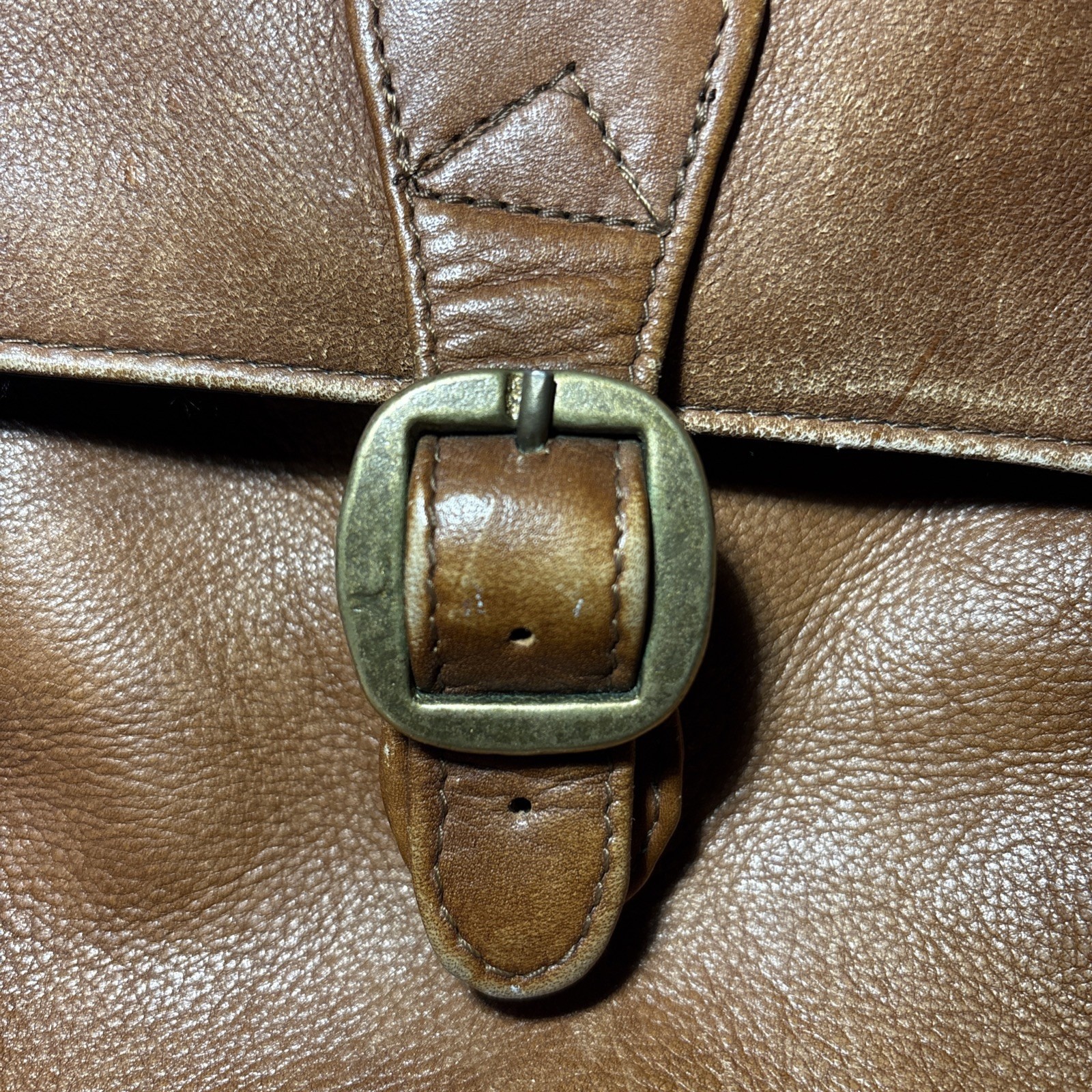 Vintage Wilsons Leather Crossbody Bag with adjustable strap and five pockets